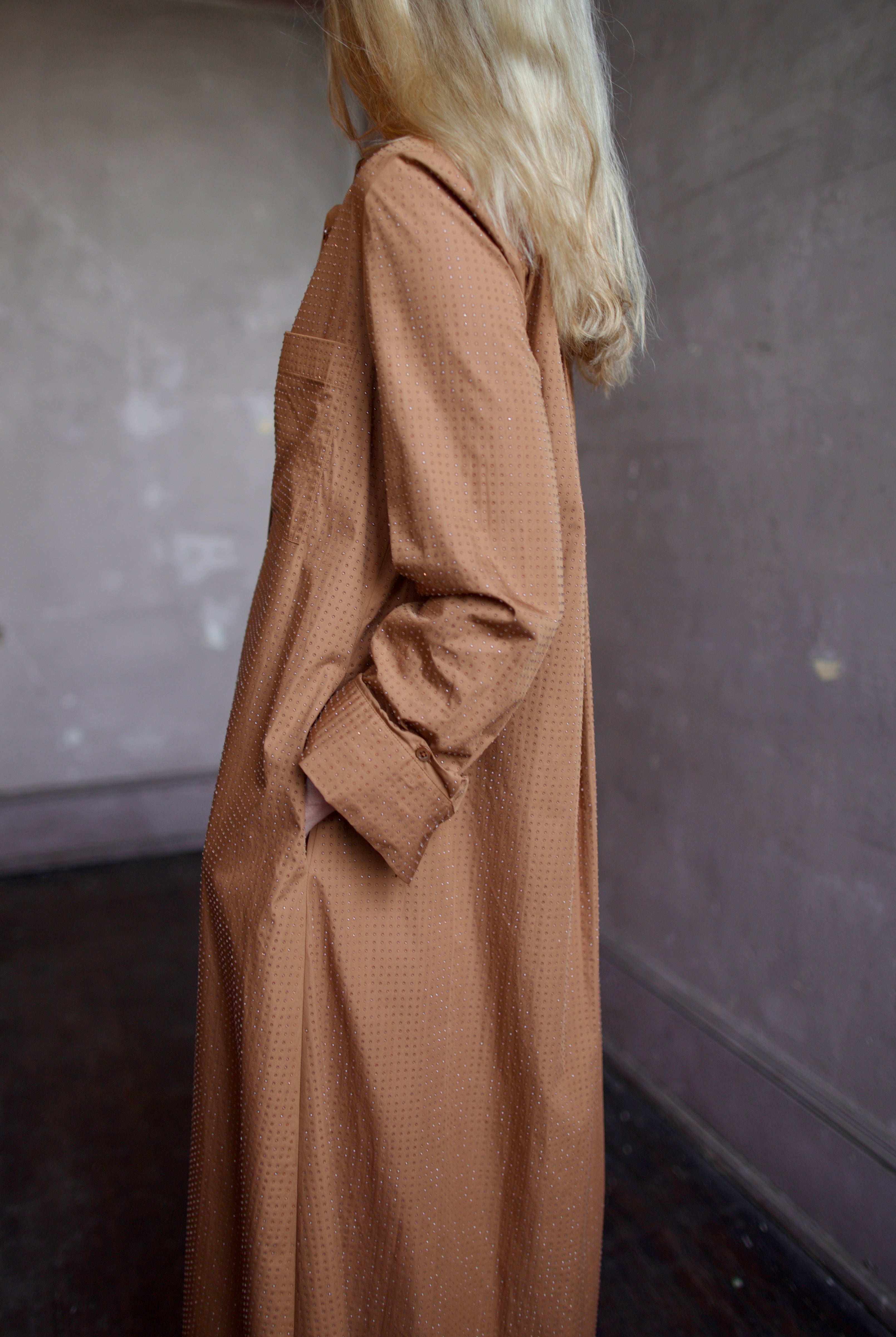 Model wearing the sophisticated TWP Jennys shirt dress embellished with crystals in warm brown