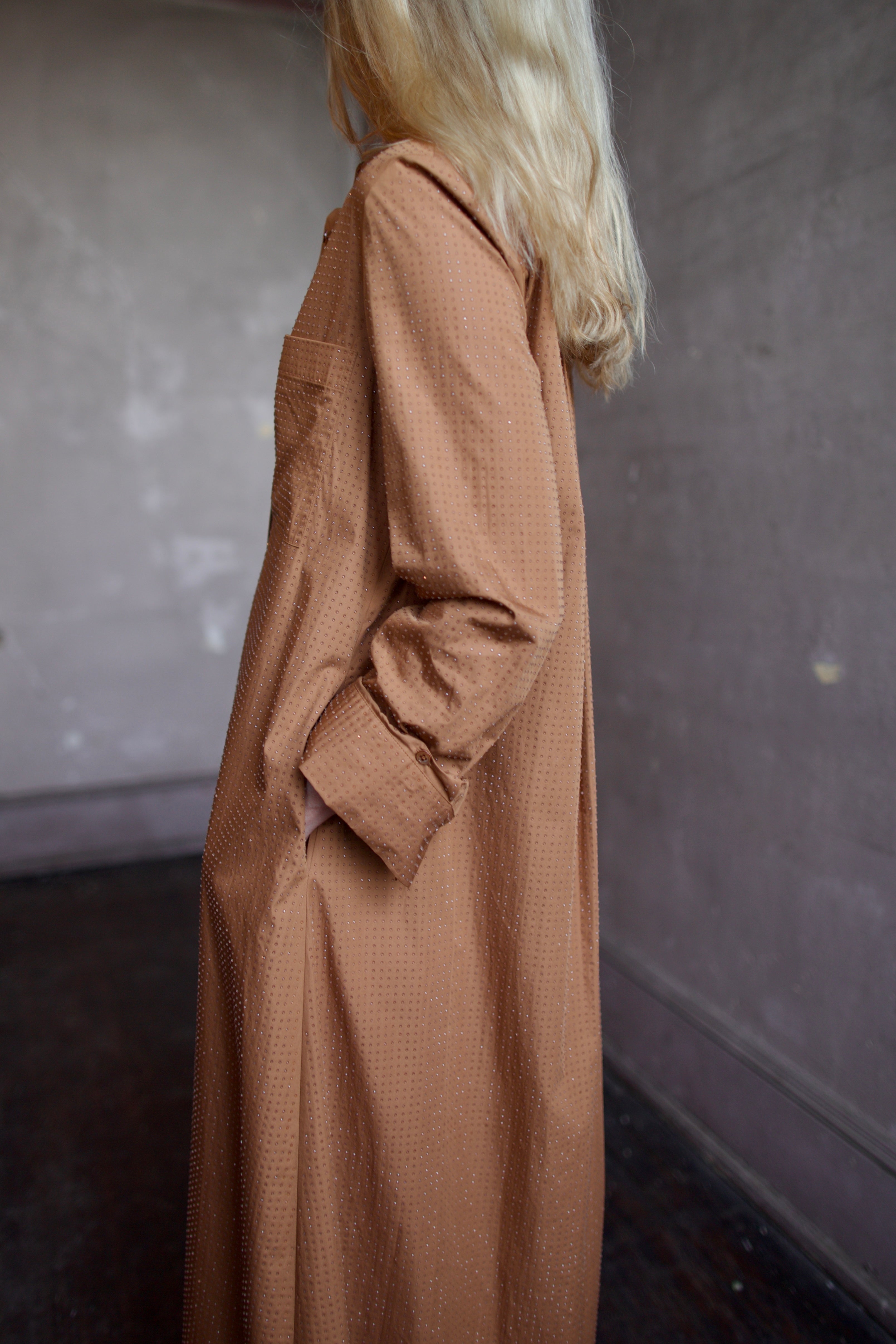 Model wearing the sophisticated TWP Jennys shirt dress embellished with crystals in warm brown