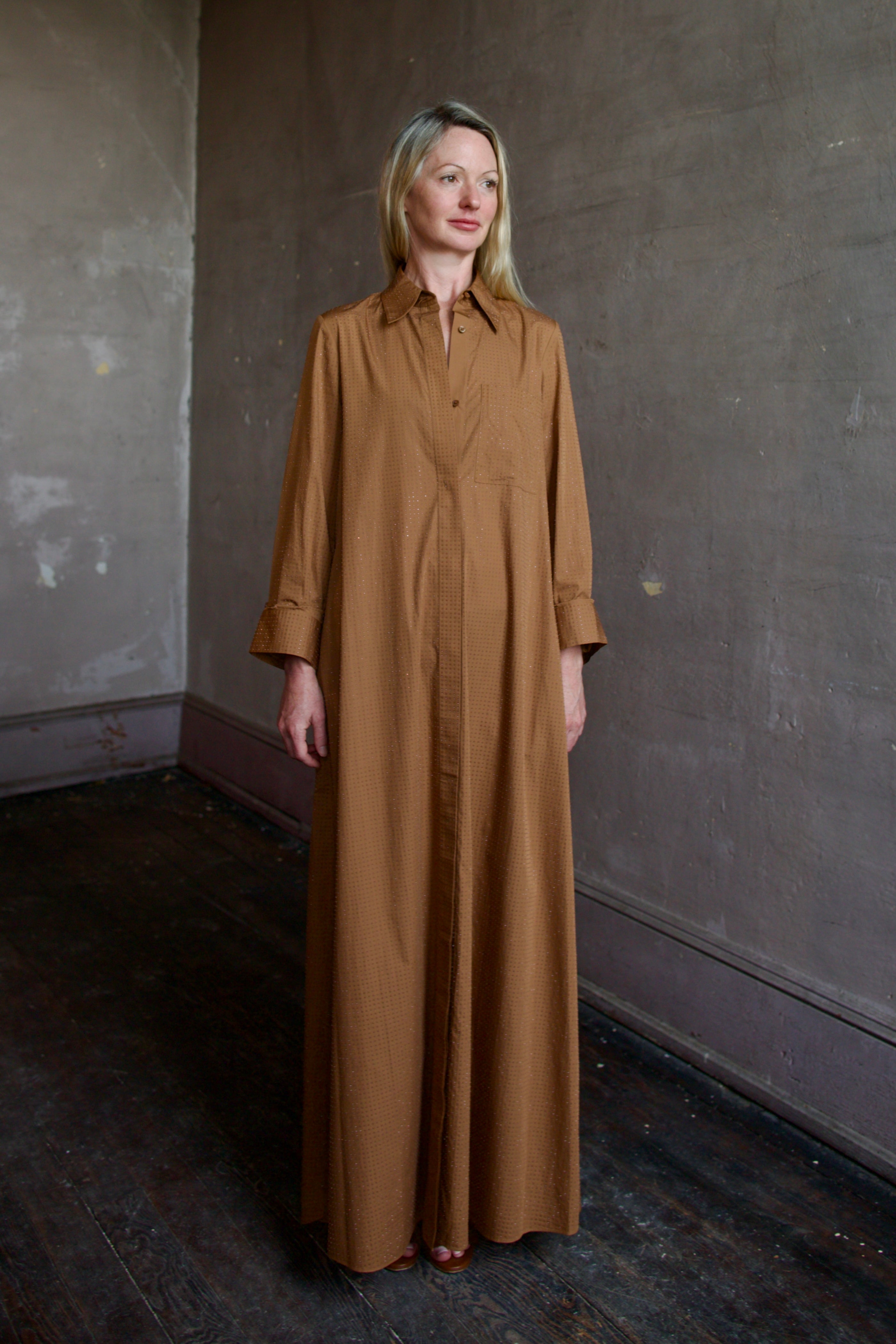 Model wearing the sophisticated TWP Jennys shirt dress embellished with crystals in warm brown