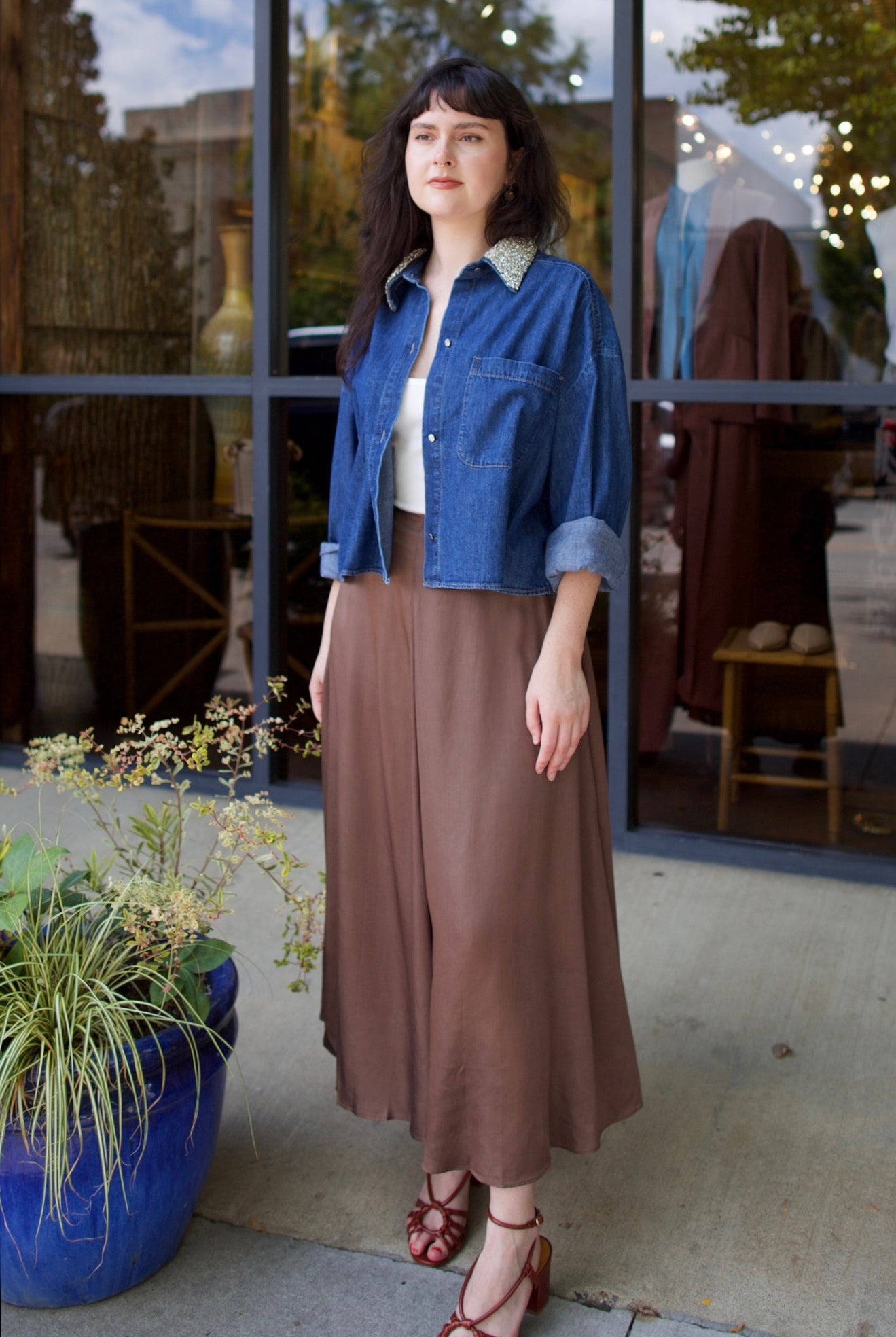 Model wearing a timeless classic tailoring Primavera skirt in a sophisticated neutral by Apiece Apart