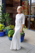 Image of a model wearing luxury TWP coated linen My Endless Love Skirt with expert tailoring for a sophisticated silhouette