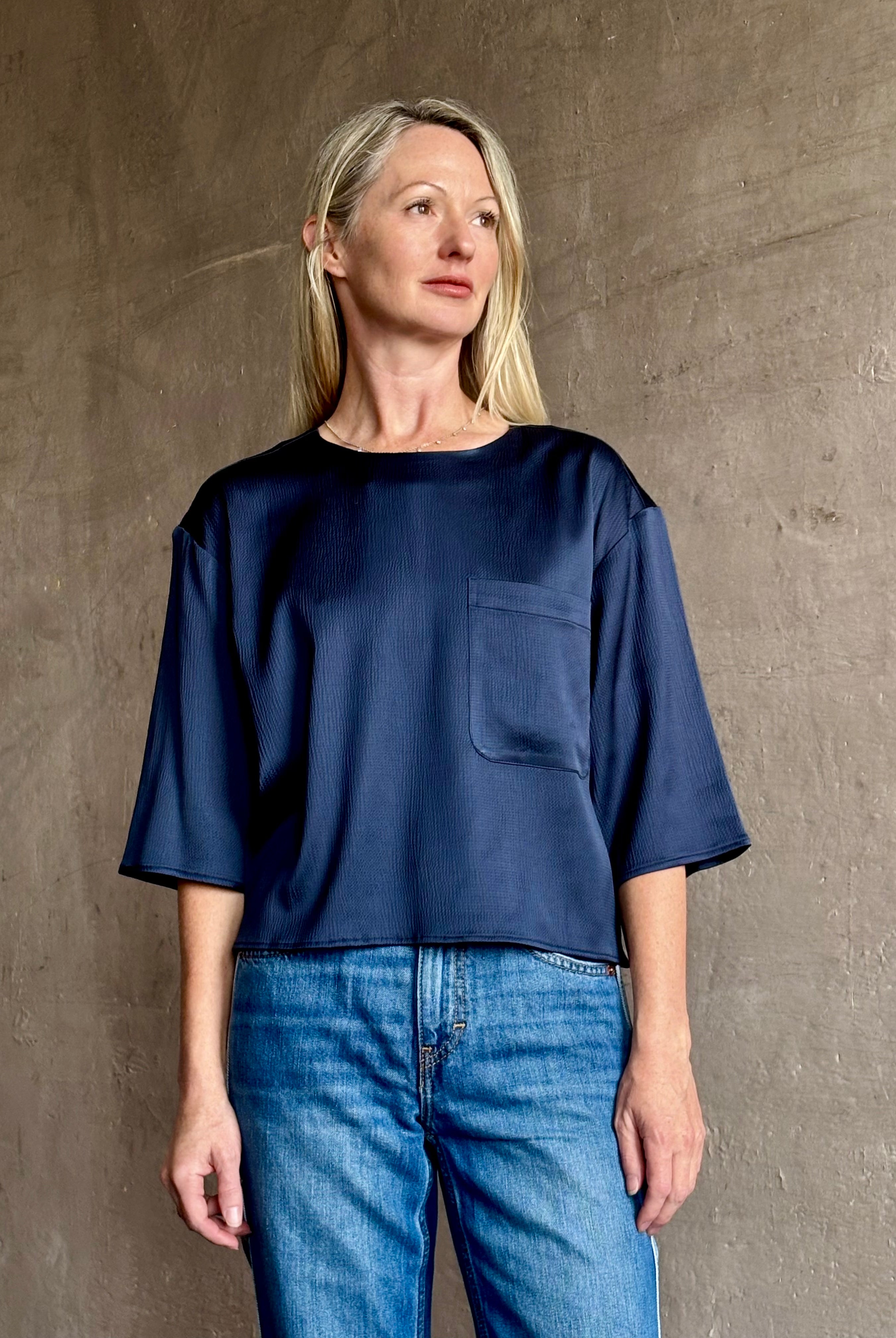 Mature woman wearing Women's luxury clothing brand TWP Ex T hammered satin short sleeves crew neck navy blue