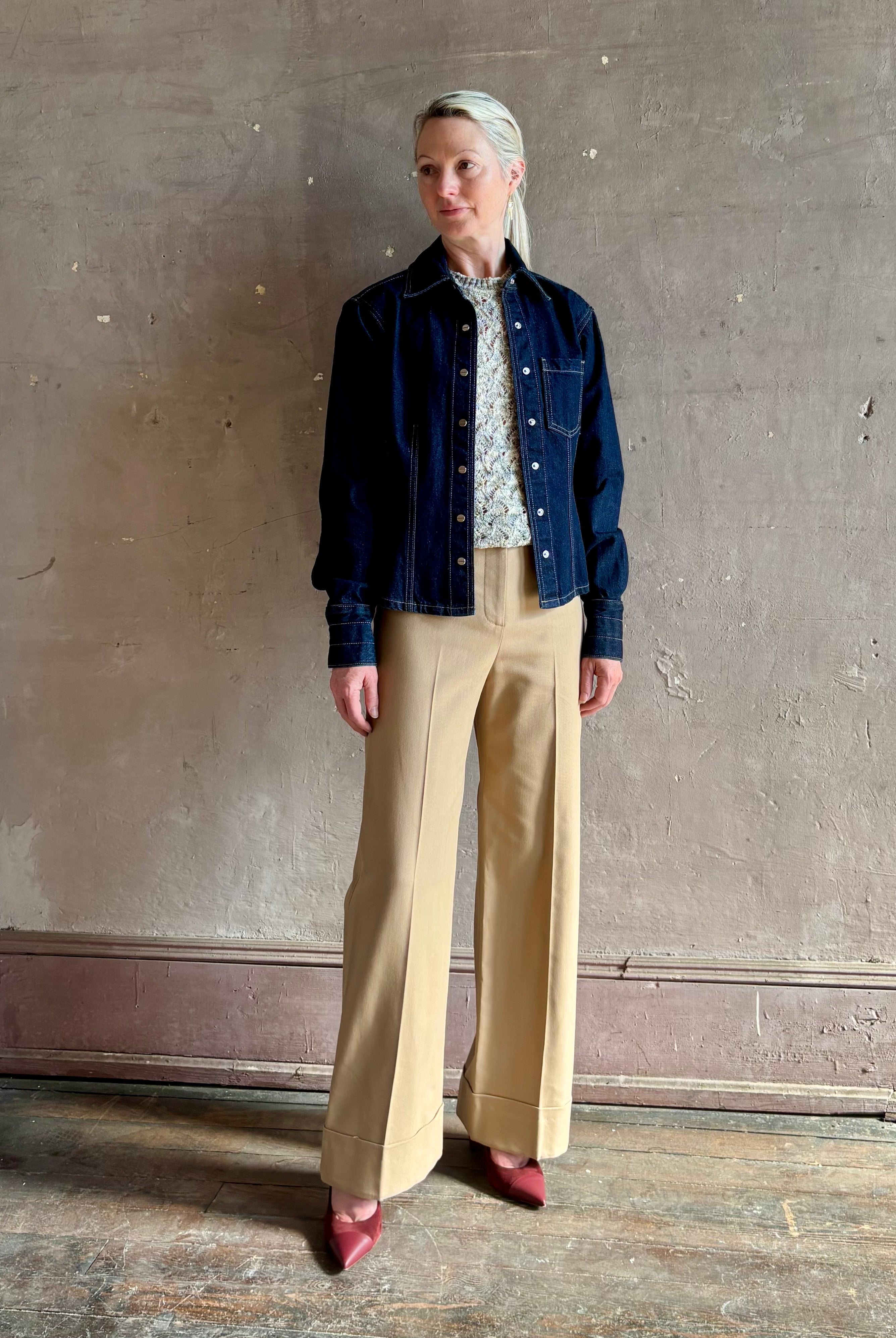 Mature woman wearing Premium Cotton American-Made Denim TWP Franny Shirt with feminine darting silhouette