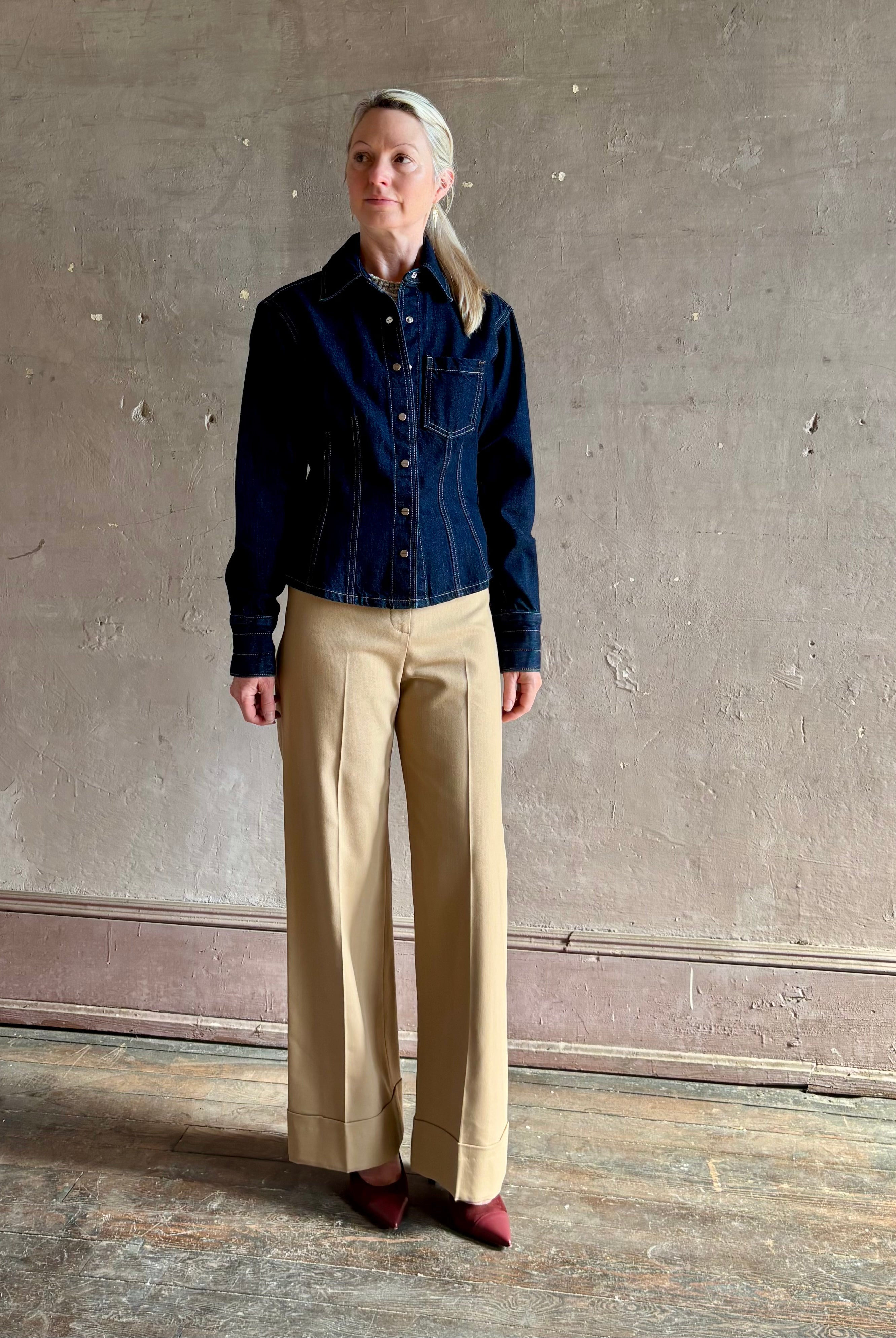 Mature woman wearing Premium Cotton American-Made Denim TWP Franny Shirt with feminine darting silhouette