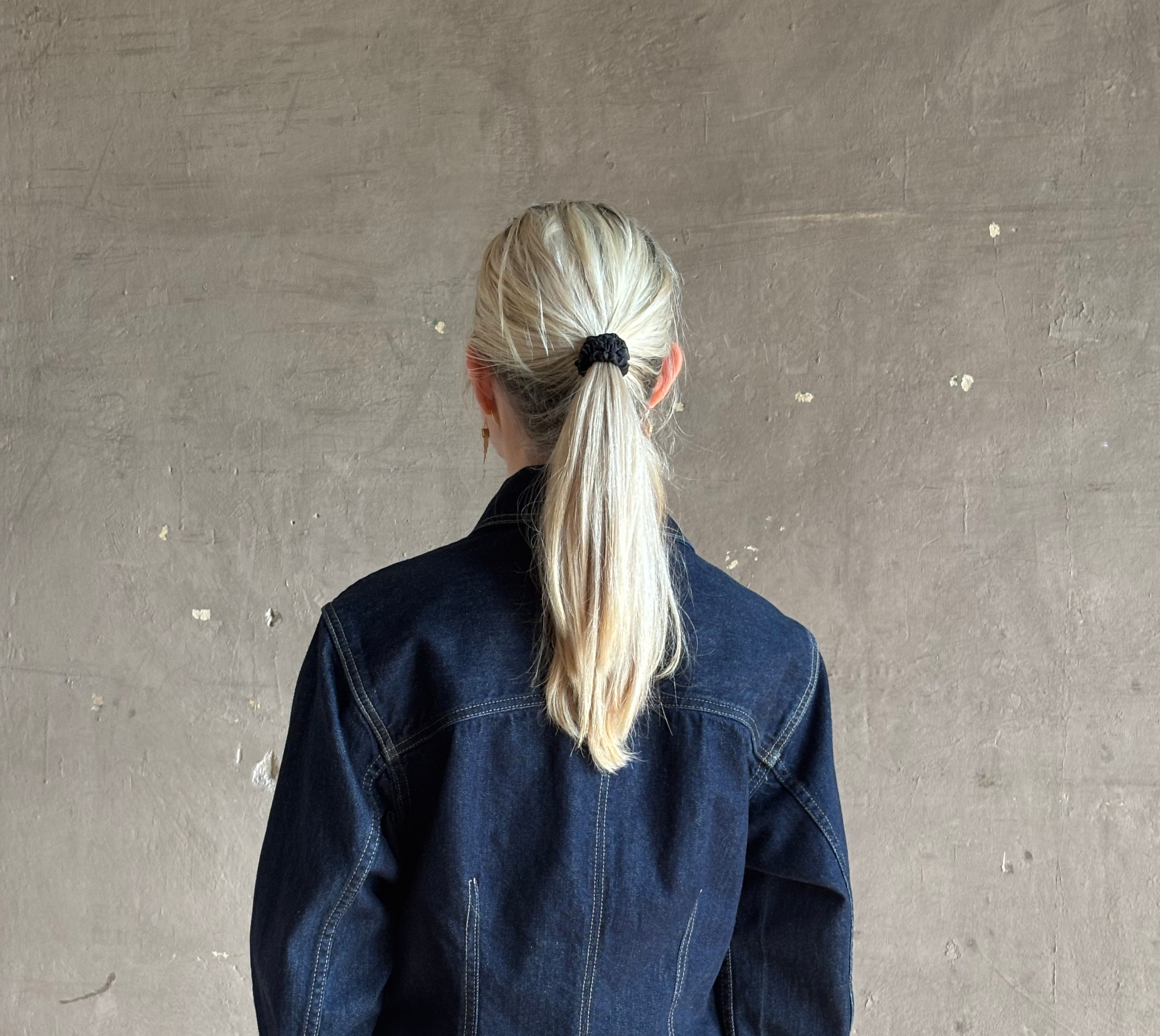 Mature woman wearing Premium Cotton American-Made Denim TWP Franny Shirt with feminine darting silhouette