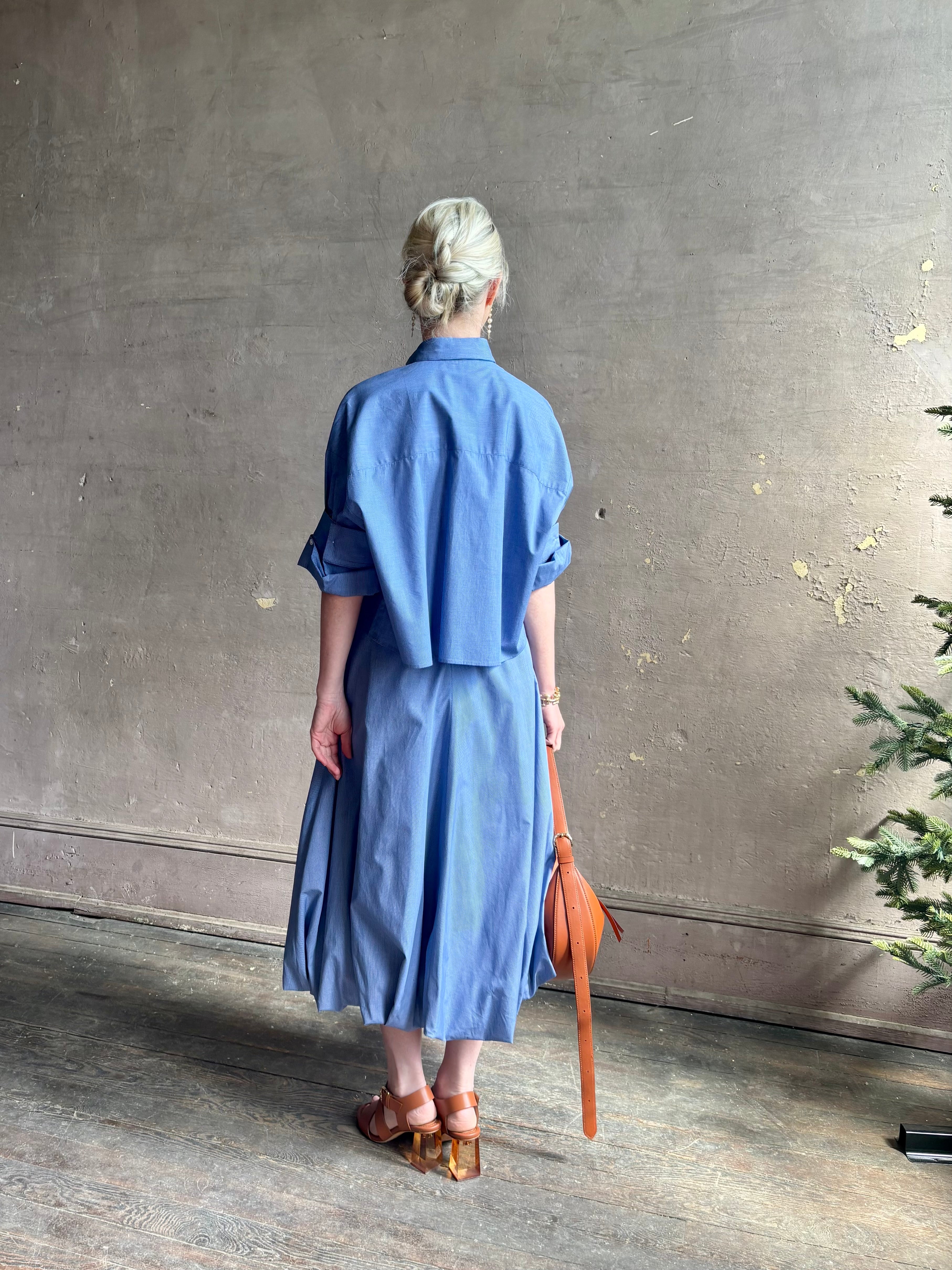 Mature woman wearing American made cotton poplin TWP blue plaid Full Intentions midi bubble Skirt with drop waist