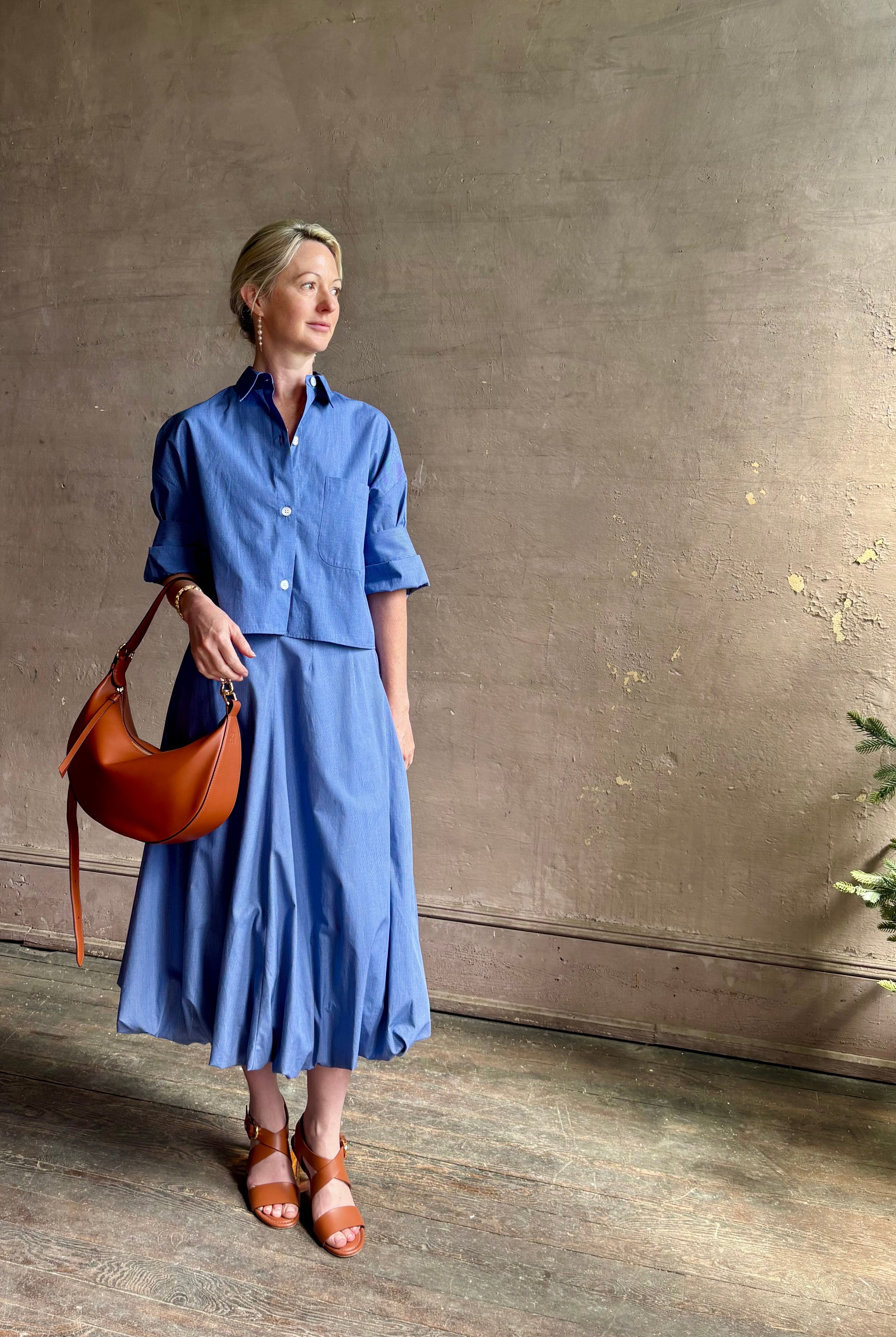 Mature woman wearing American made cotton poplin TWP blue plaid Full Intentions midi bubble Skirt with drop waist
