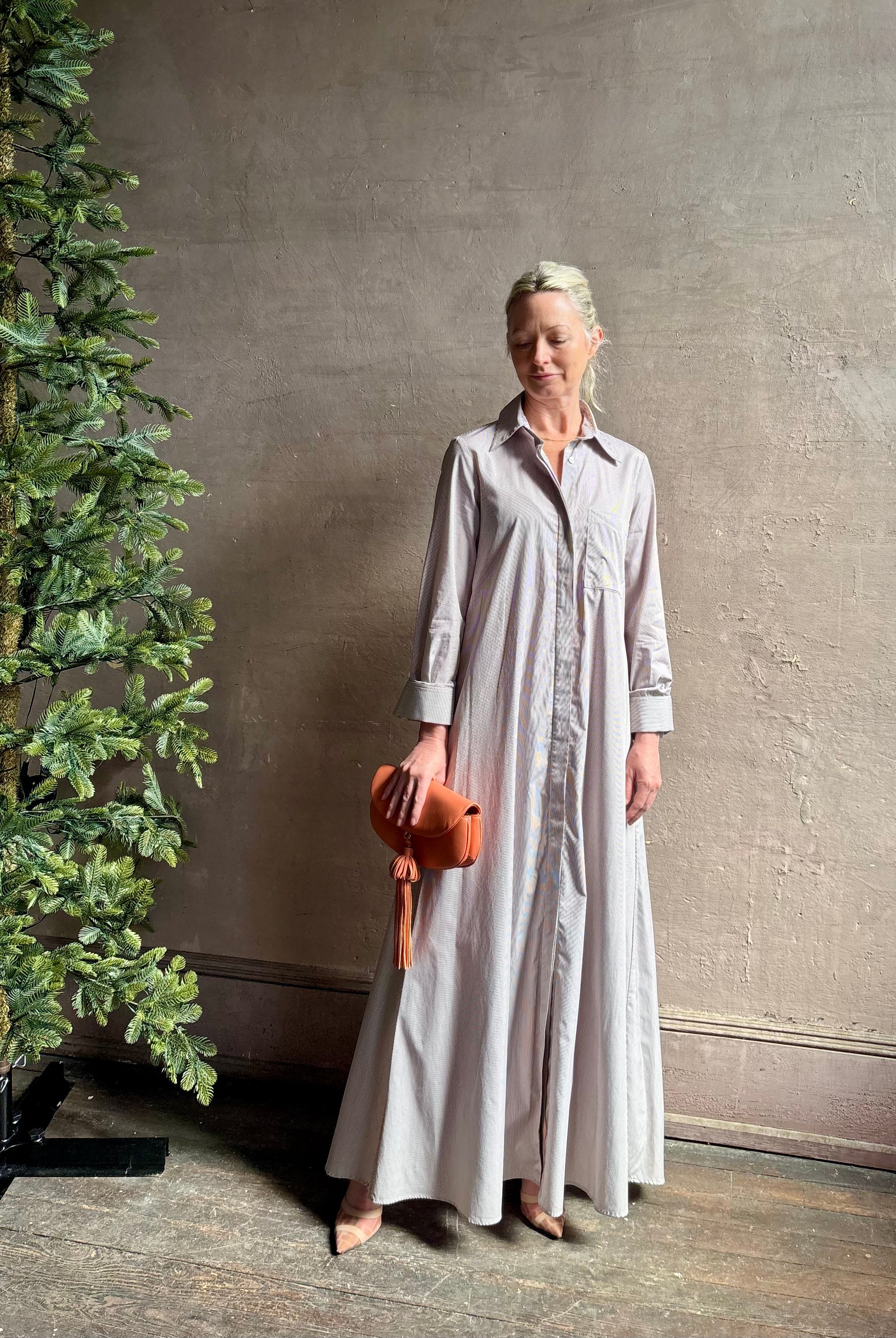 Mature woman wearing luxury TWP Jenny's Gown in Brown Stripe effortless sophistication in a comfortable premium cotton