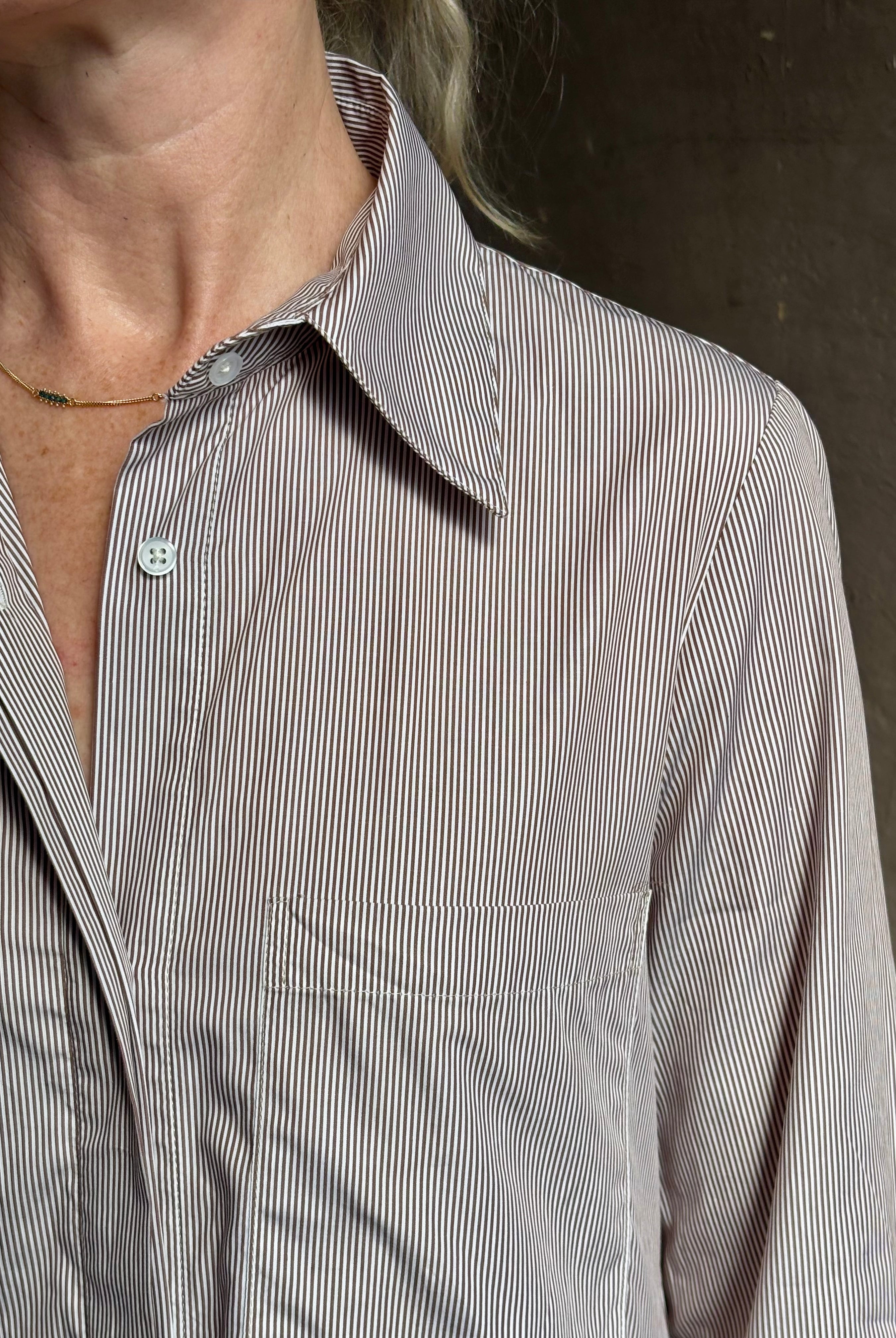 Mature woman wearing luxury TWP Jenny's Gown in Brown Stripe effortless sophistication in a comfortable premium cotton