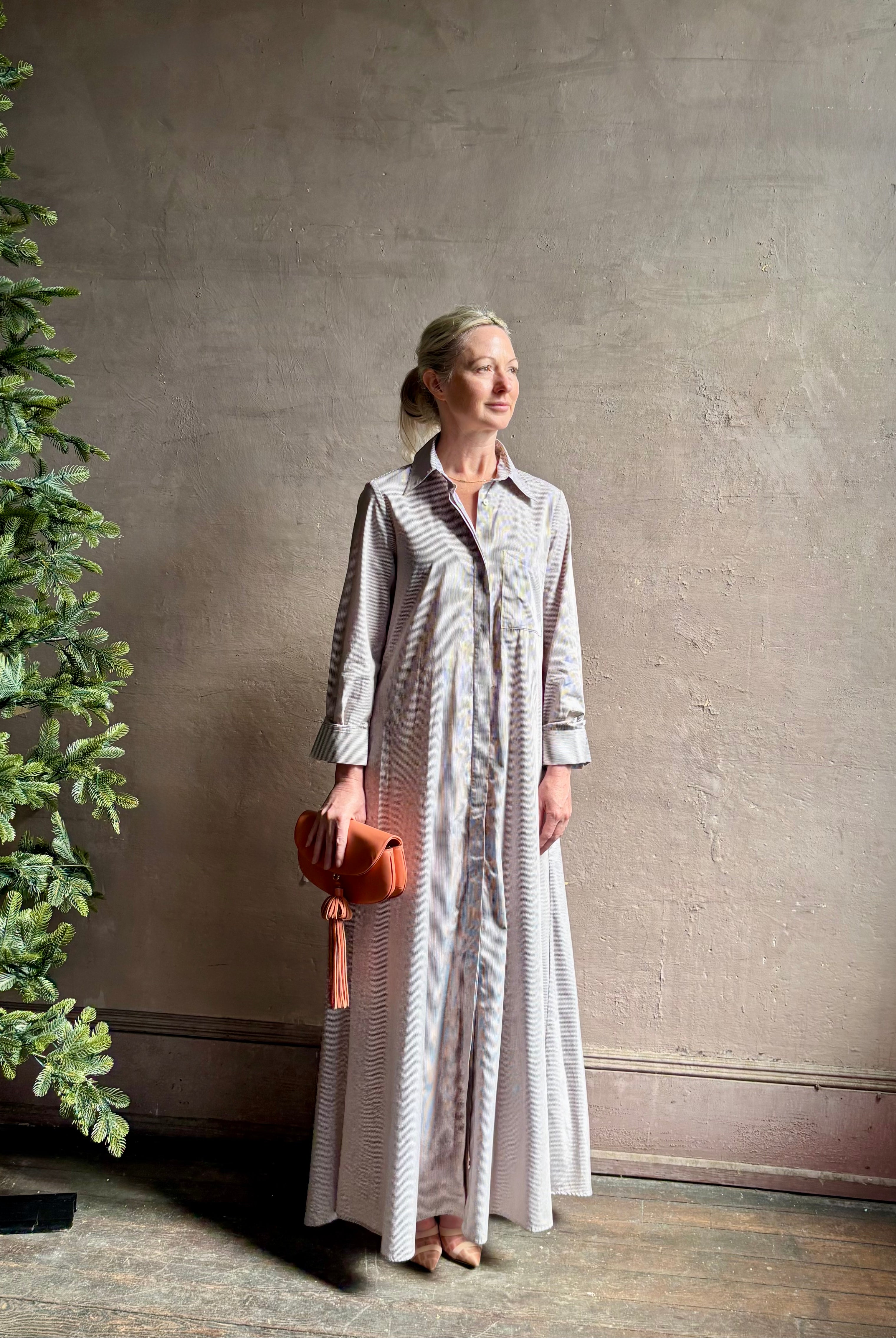Mature woman wearing luxury TWP Jenny's Gown in Brown Stripe effortless sophistication in a comfortable premium cotton