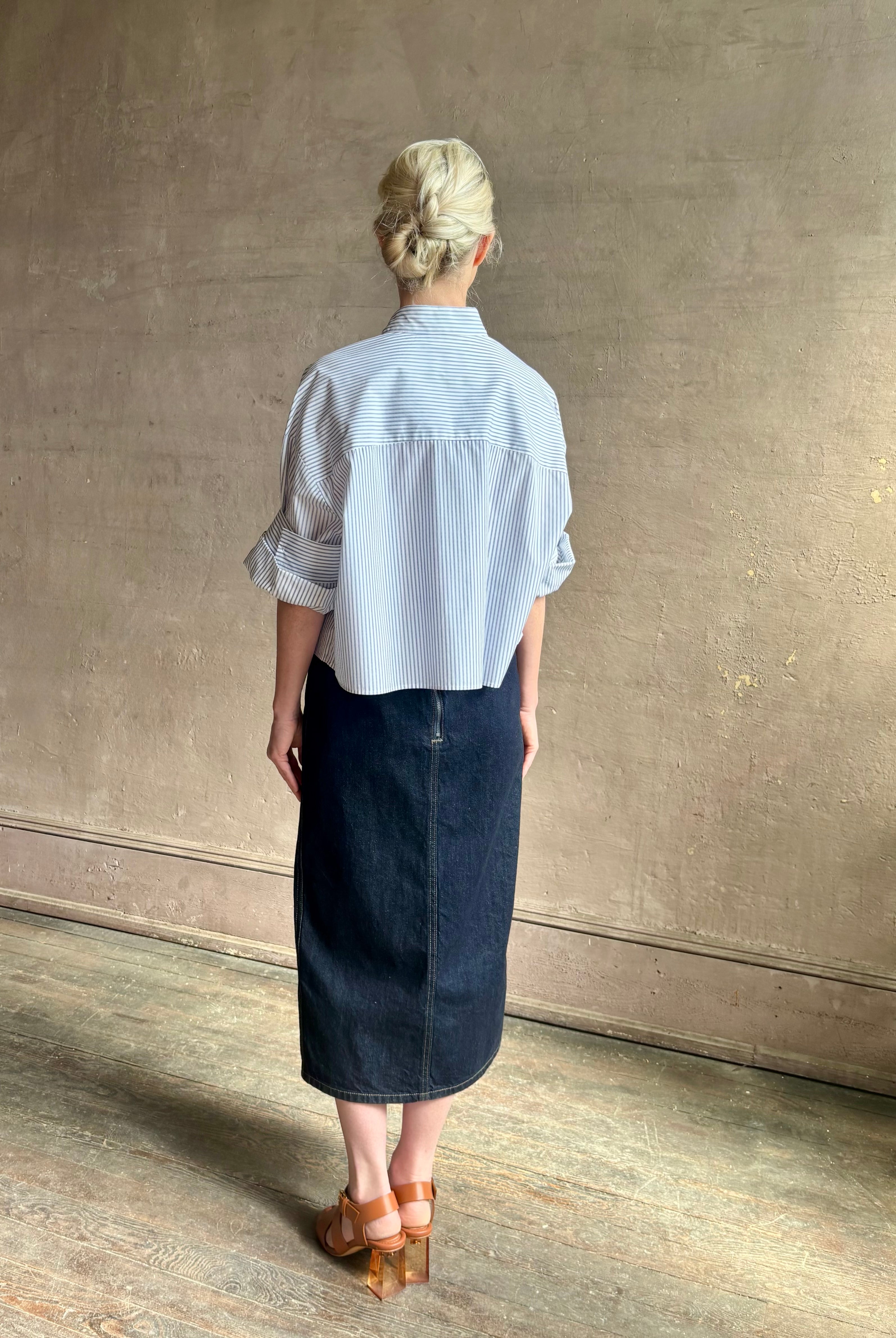 Woman wearing luxury cotton poplin TWP Next EX Shirt White and navy stripe with collar button front made in USA