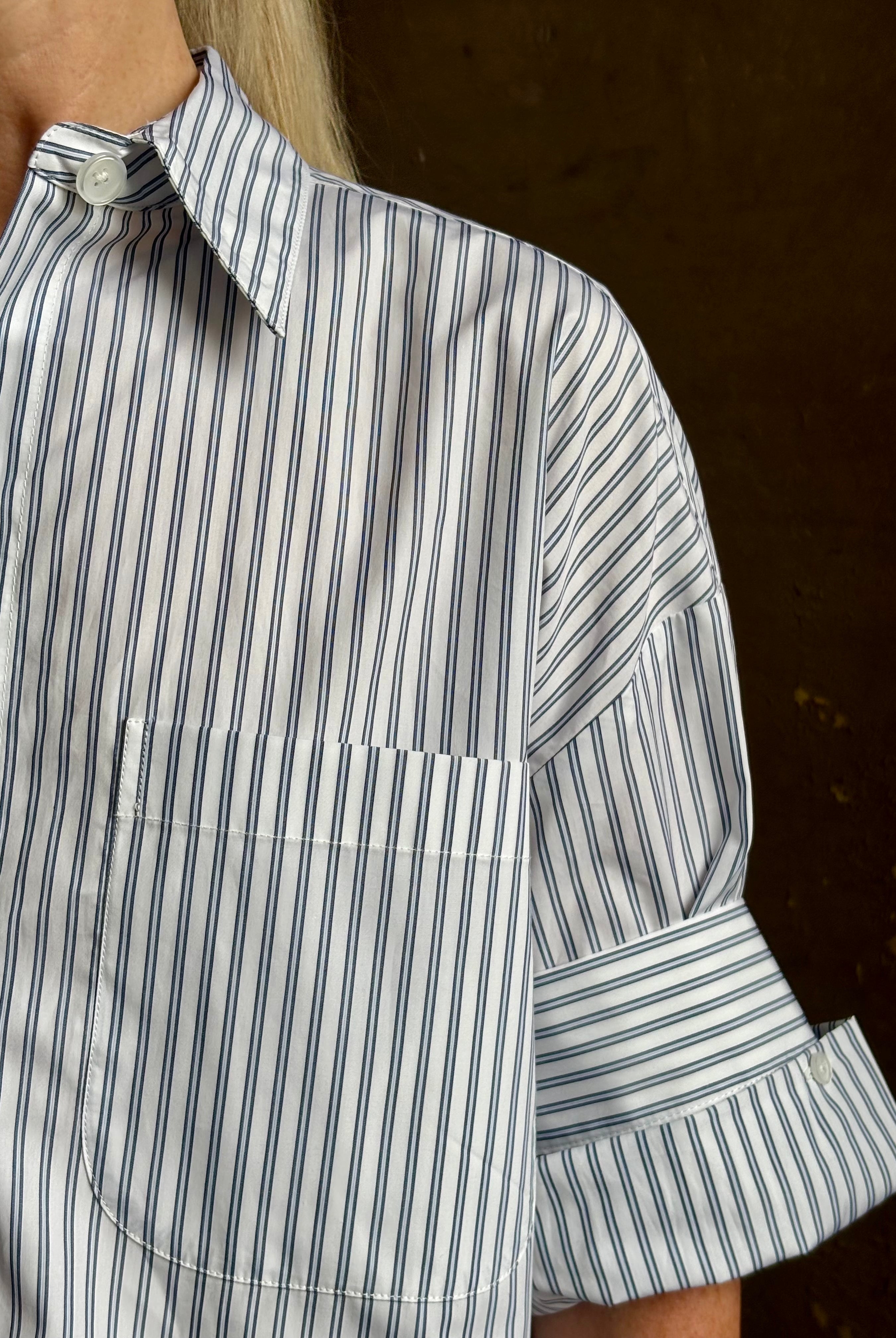 Mature woman wearing TWP next Ex cotton poplin shirt button front striped blue and white collar tailored cuffs