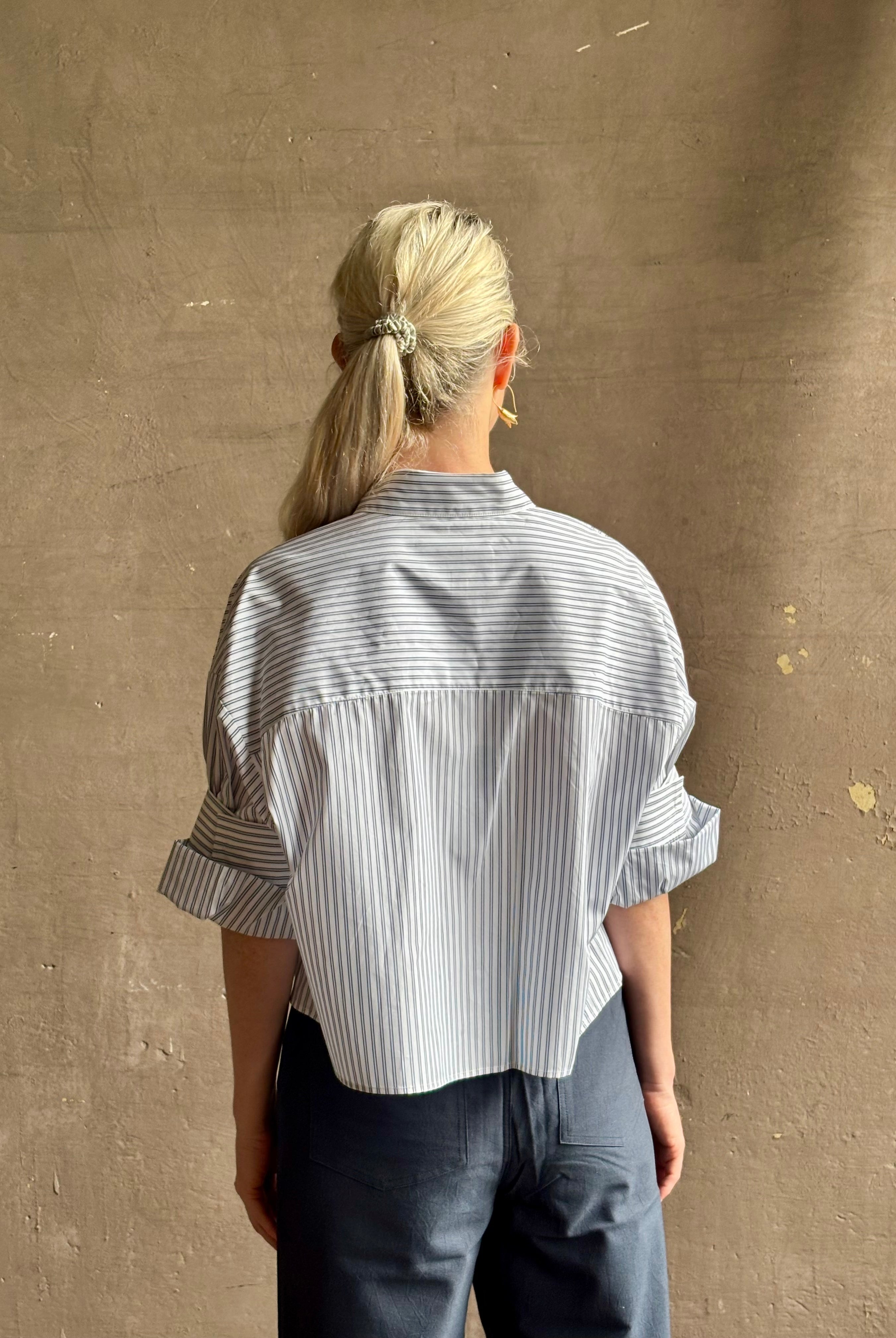 Mature woman wearing TWP next Ex cotton poplin shirt button front striped blue and white collar tailored cuffs