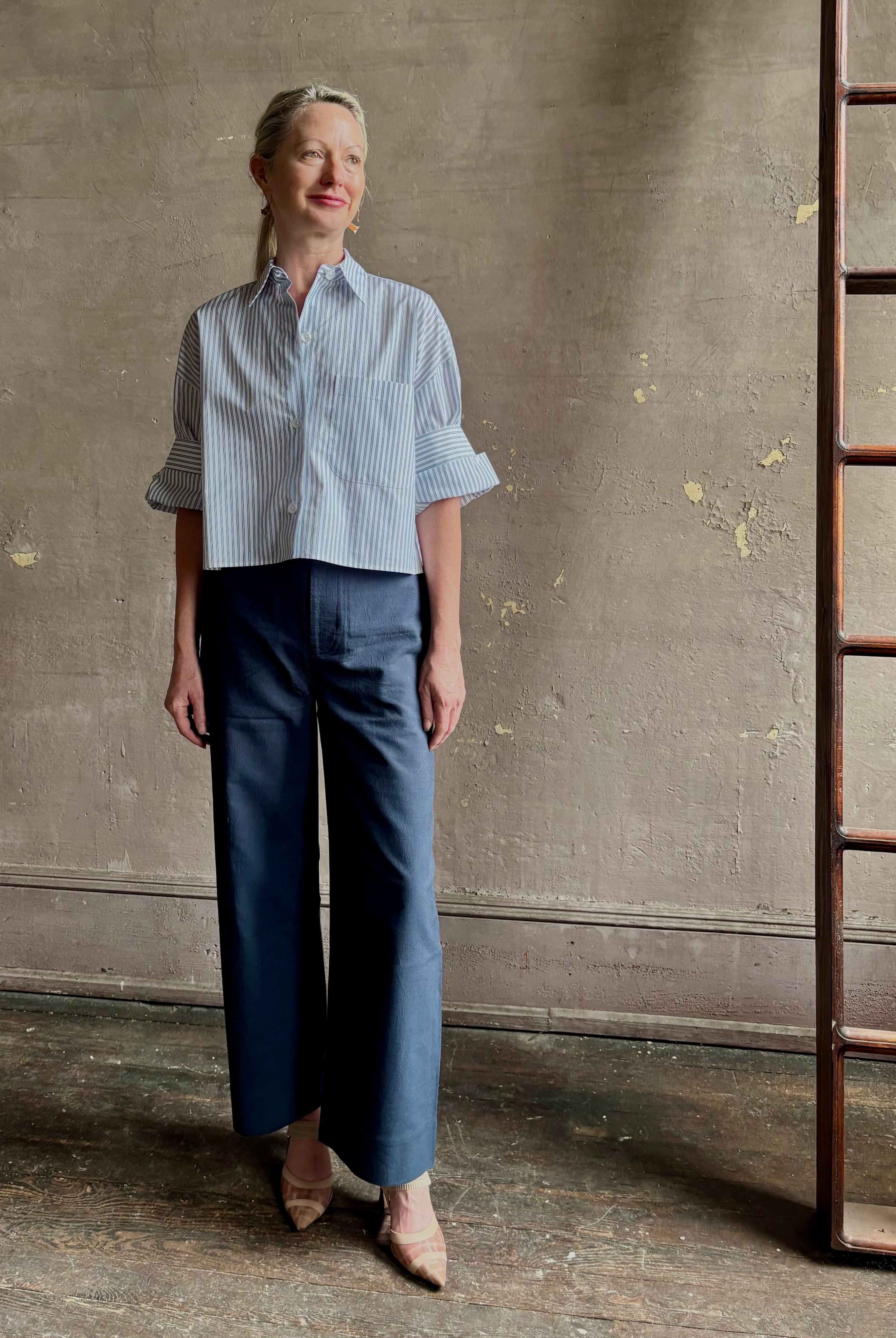 Mature woman wearing TWP next Ex cotton poplin shirt button front striped blue and white collar tailored cuffs