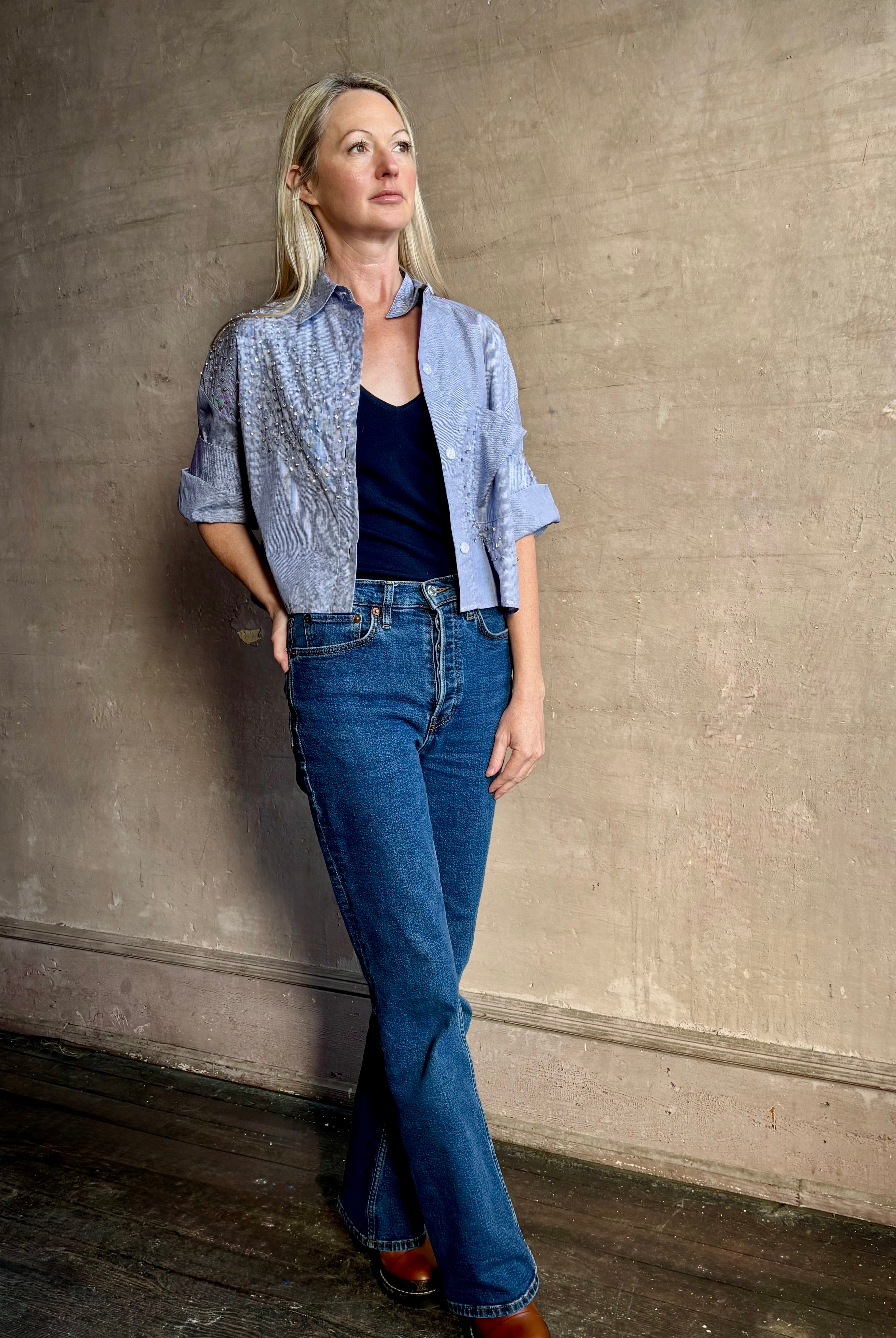 Mature woman wearing premium cotton TWP Next EX Crystal-Embellished blue and white striped Shirt with button front