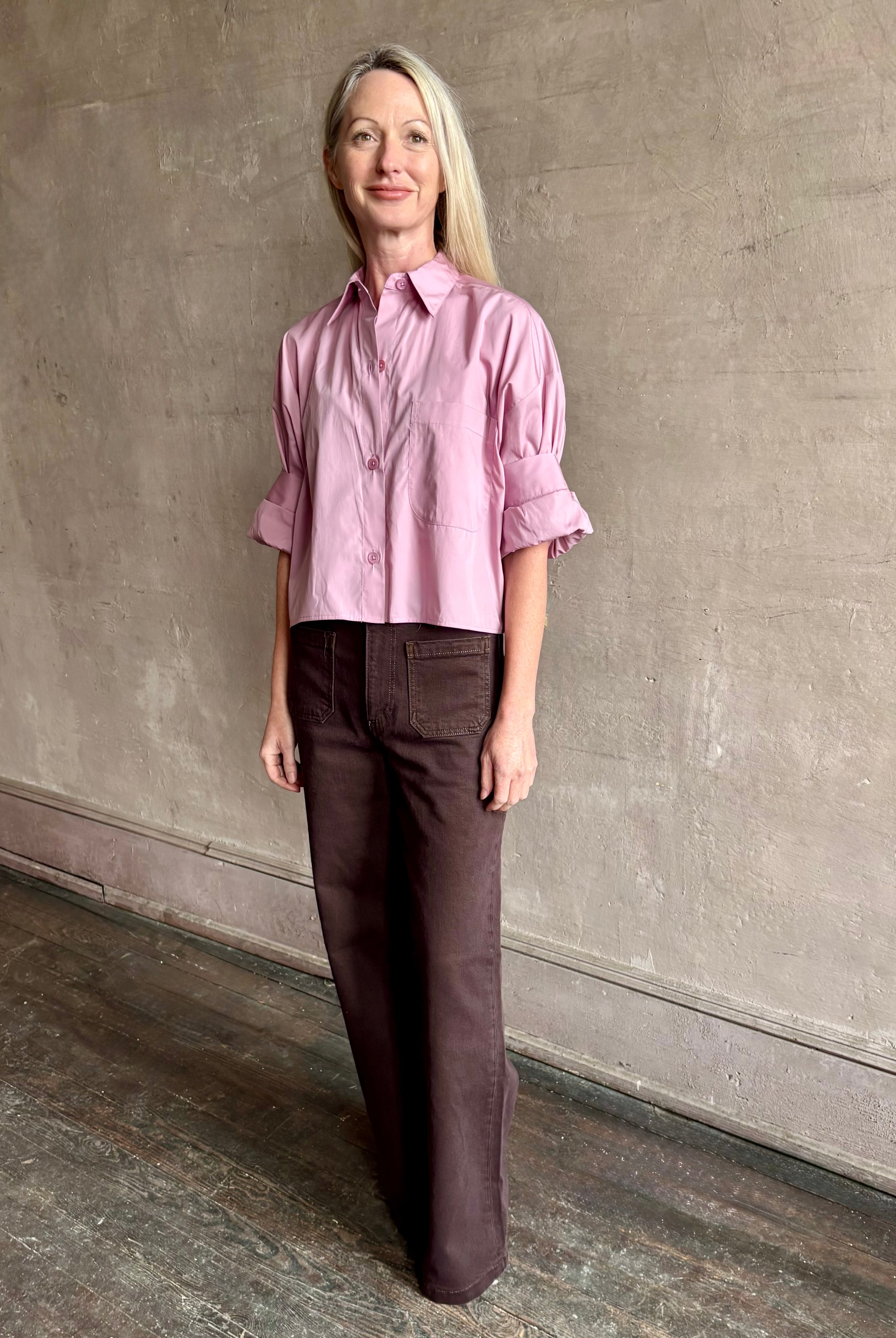 Woman wearing premium cotton TWP Next EX button up cropped shirt with half sleeve in lilac and made in USA
