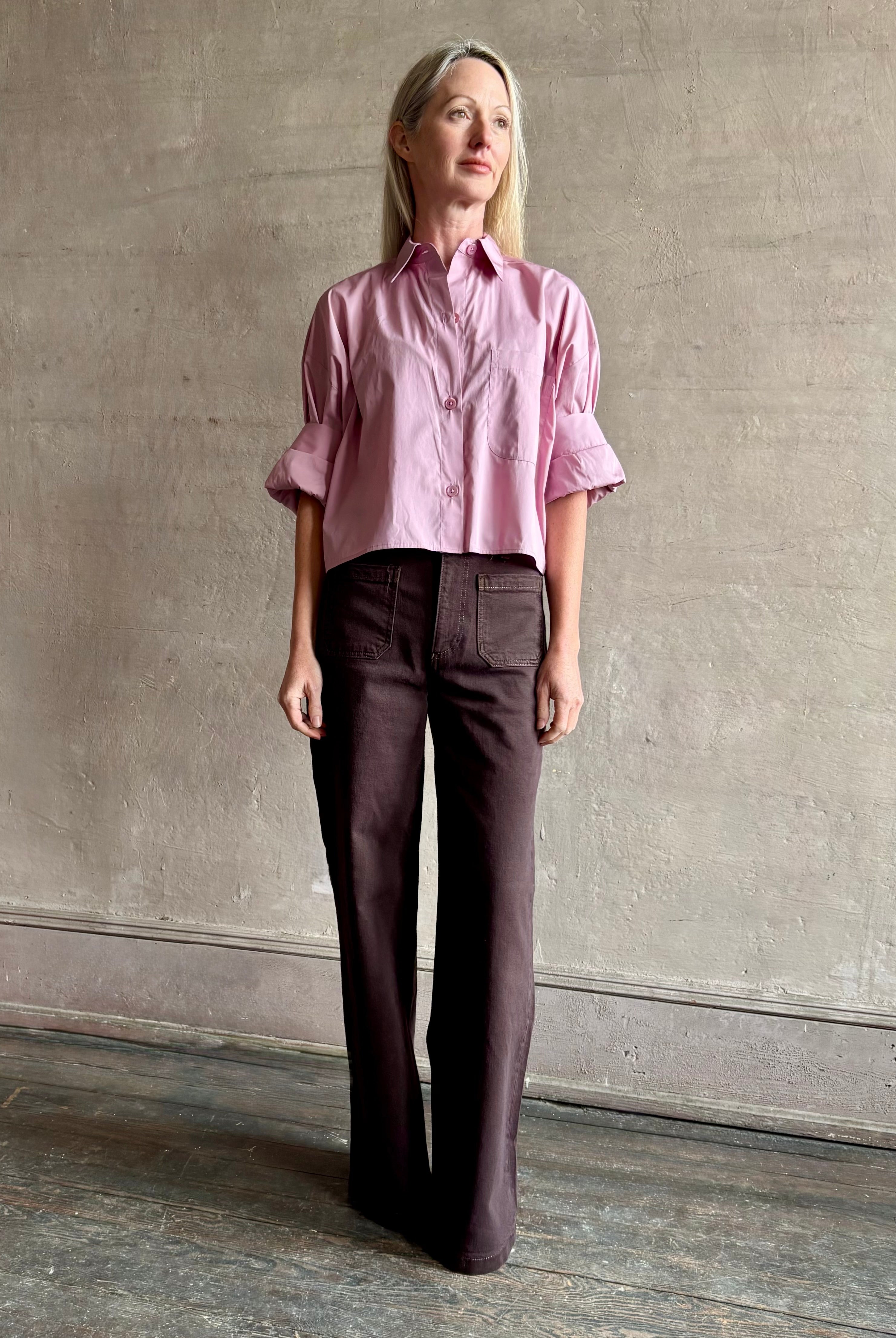 Woman wearing premium cotton TWP Next EX button up cropped shirt with half sleeve in lilac and made in USA