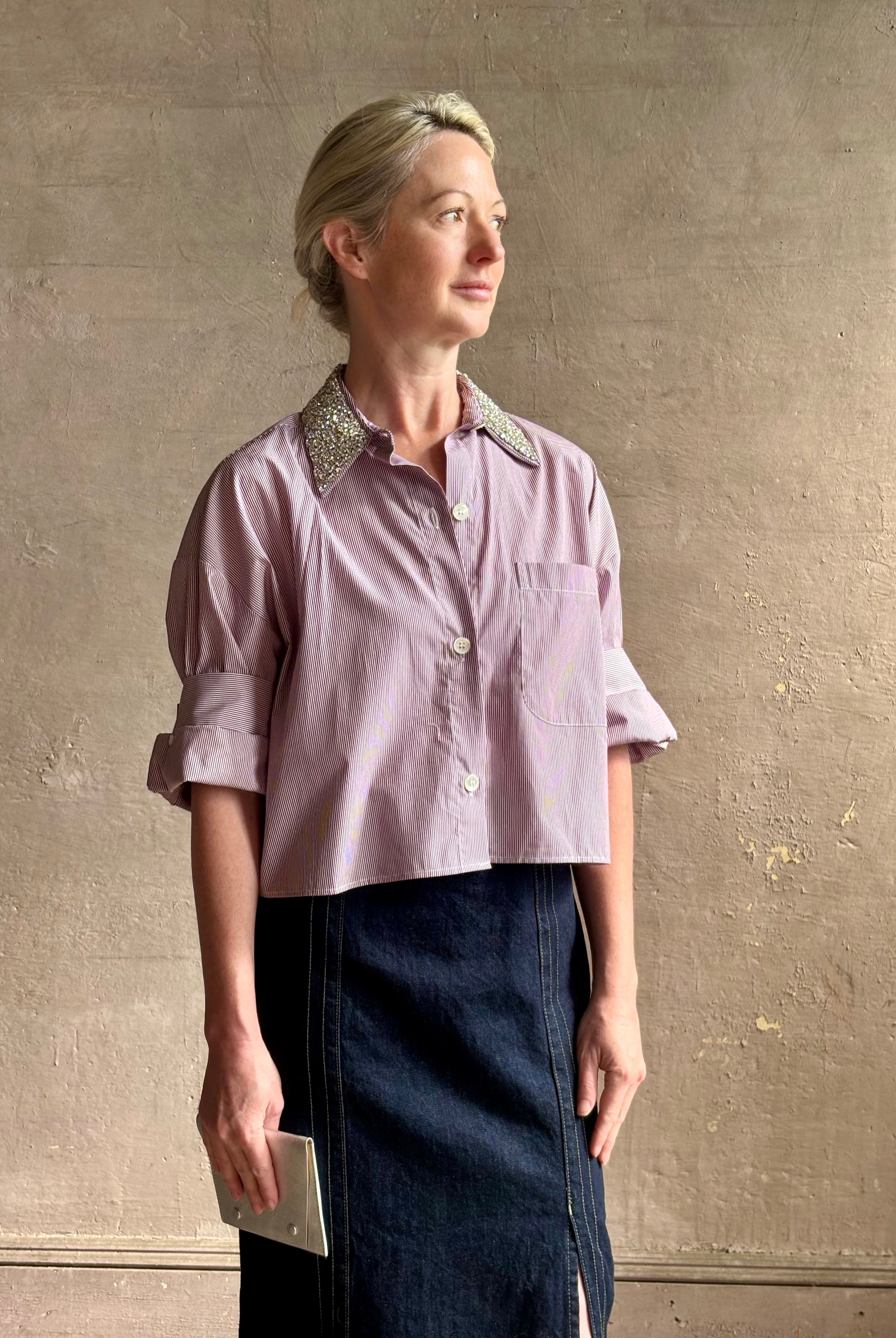 Image of mature woman wearing sophisticated TWP Next EX cotton shirt with elevated Crystal embellished Collar in White and wine stripe made in USA