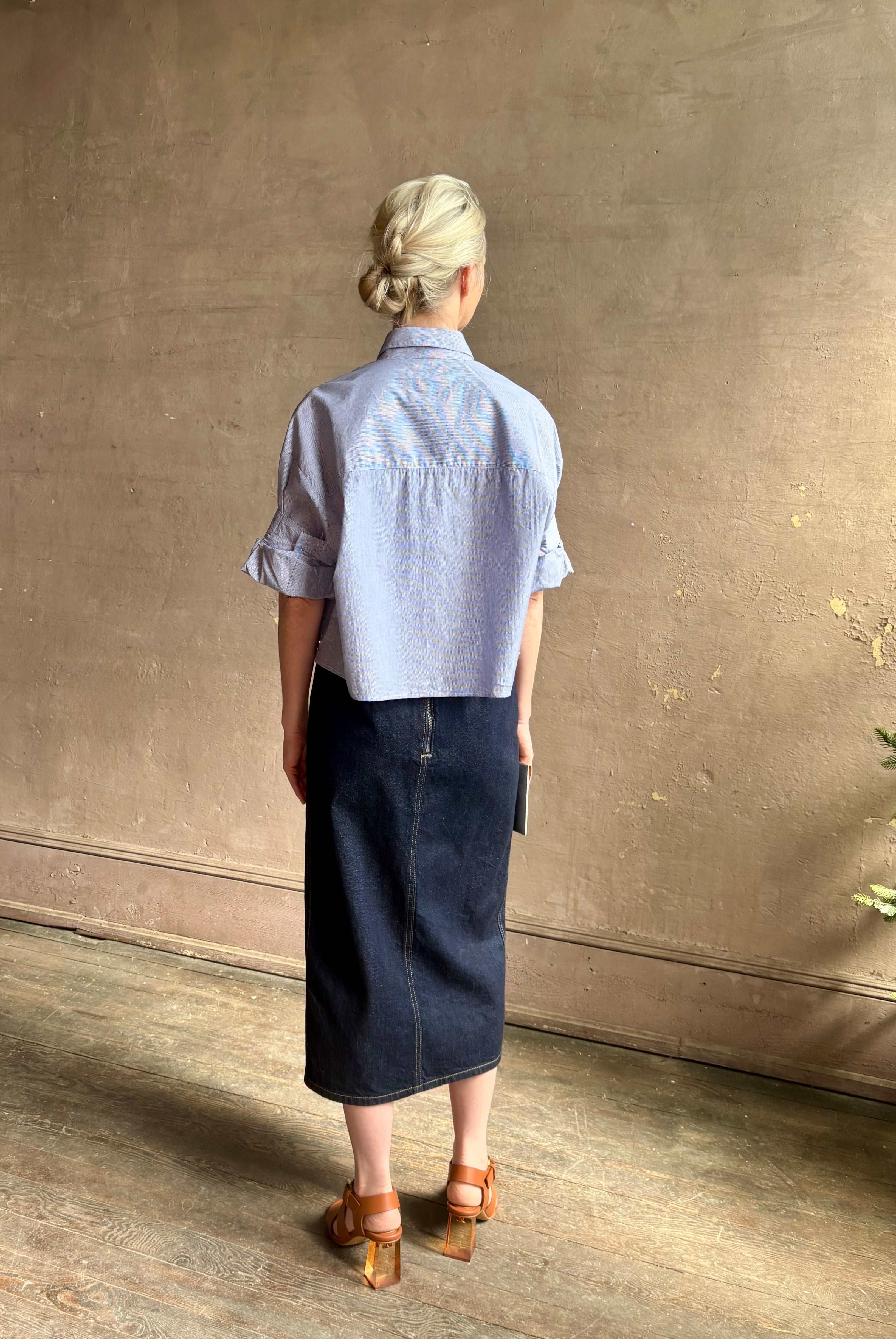 Mature woman wearing premium cotton TWP Next EX Crystal-Embellished blue and white striped Shirt with button front, collar and signature tailored cuffed sleeve detail