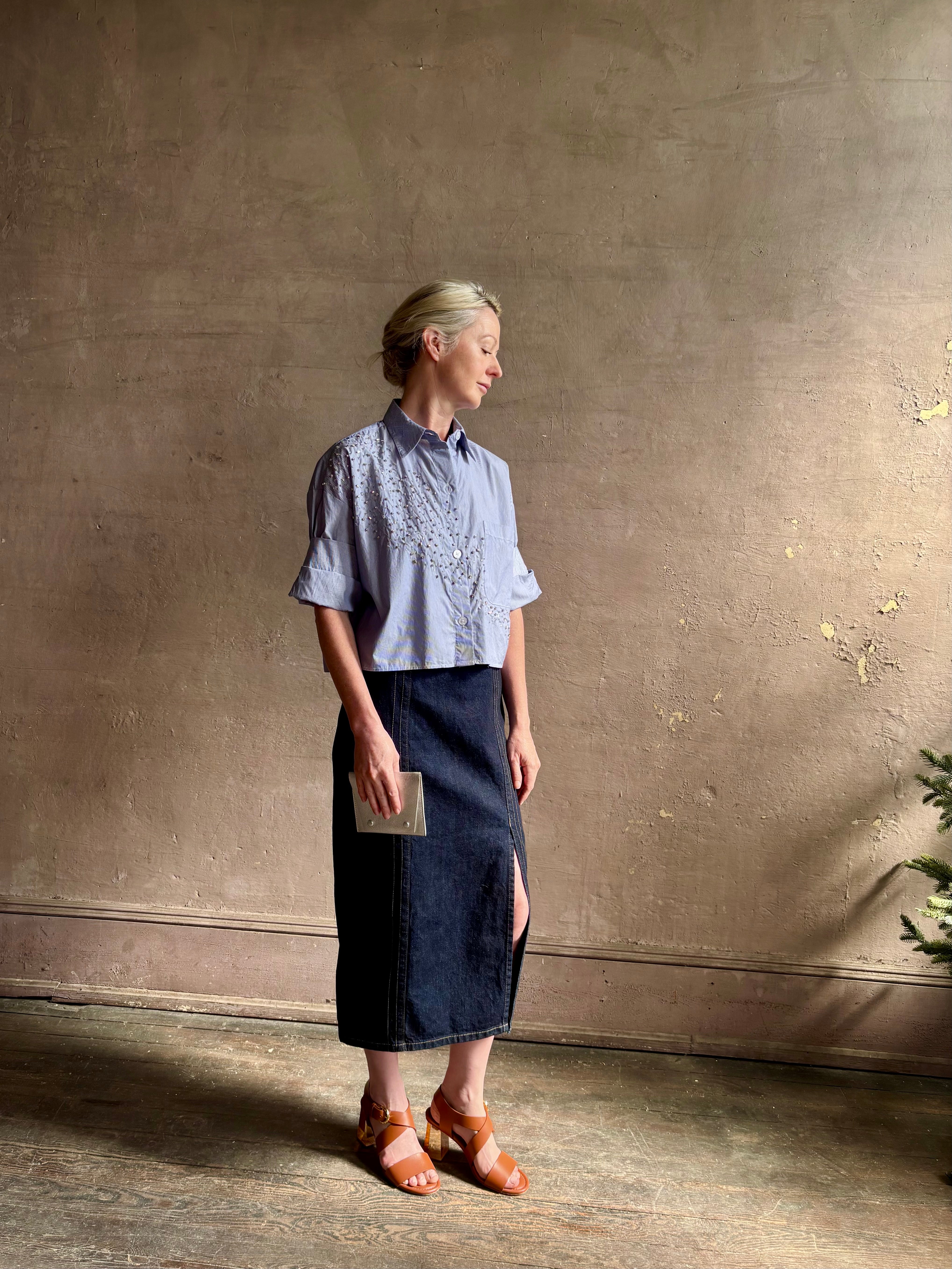 Mature woman wearing premium cotton TWP Next EX Crystal-Embellished blue and white striped Shirt with button front, collar and signature tailored cuffed sleeve detail