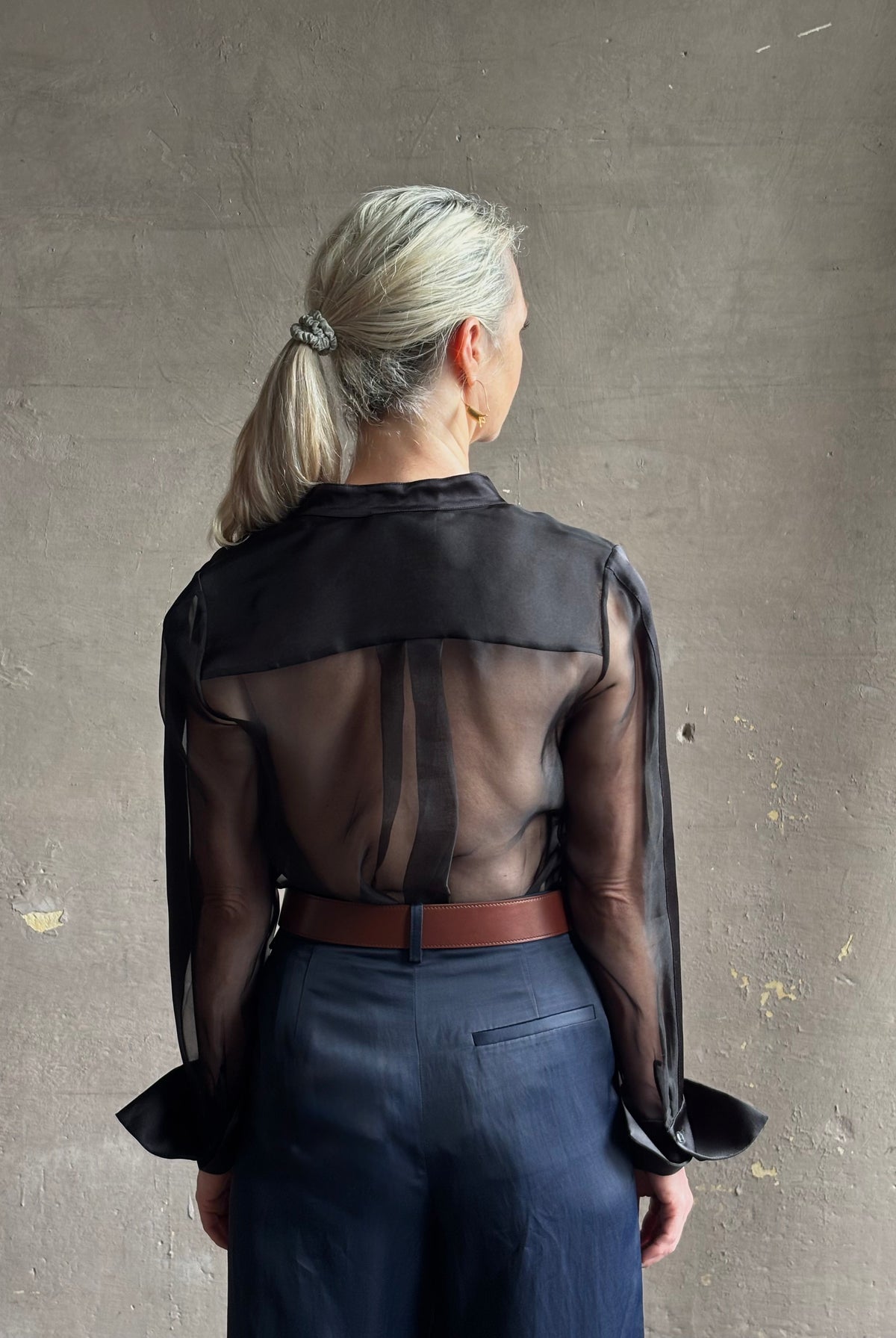 Mature woman wearing TWP Peyton sheer Silk Blouse tuxedo tailored silhouette Timeless, occassion ready