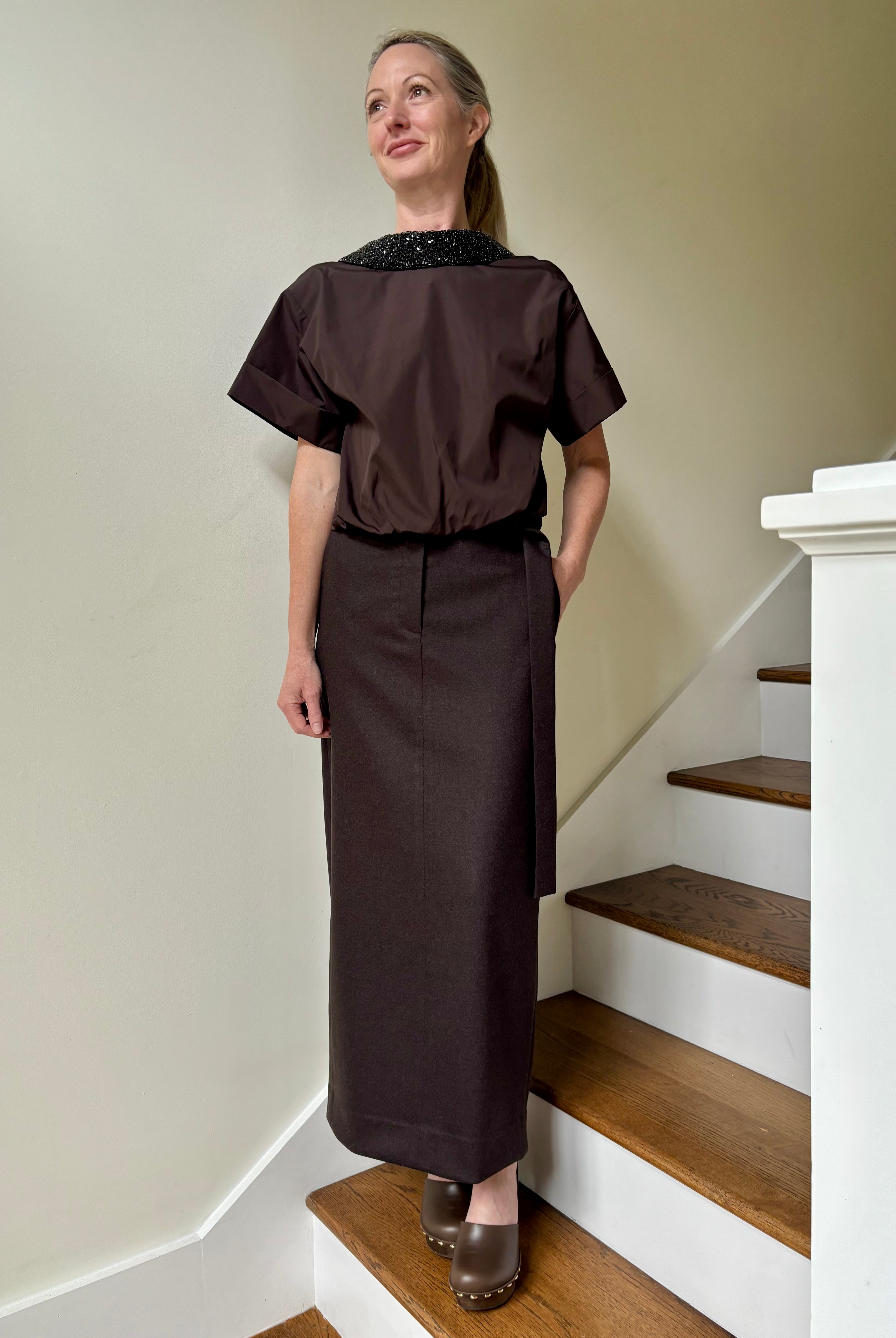 Image of mature woman wearing TWP tailored Slit maxi Skirt in Chocolate brown in a Premium Wool Cashmere Blend and American-Made