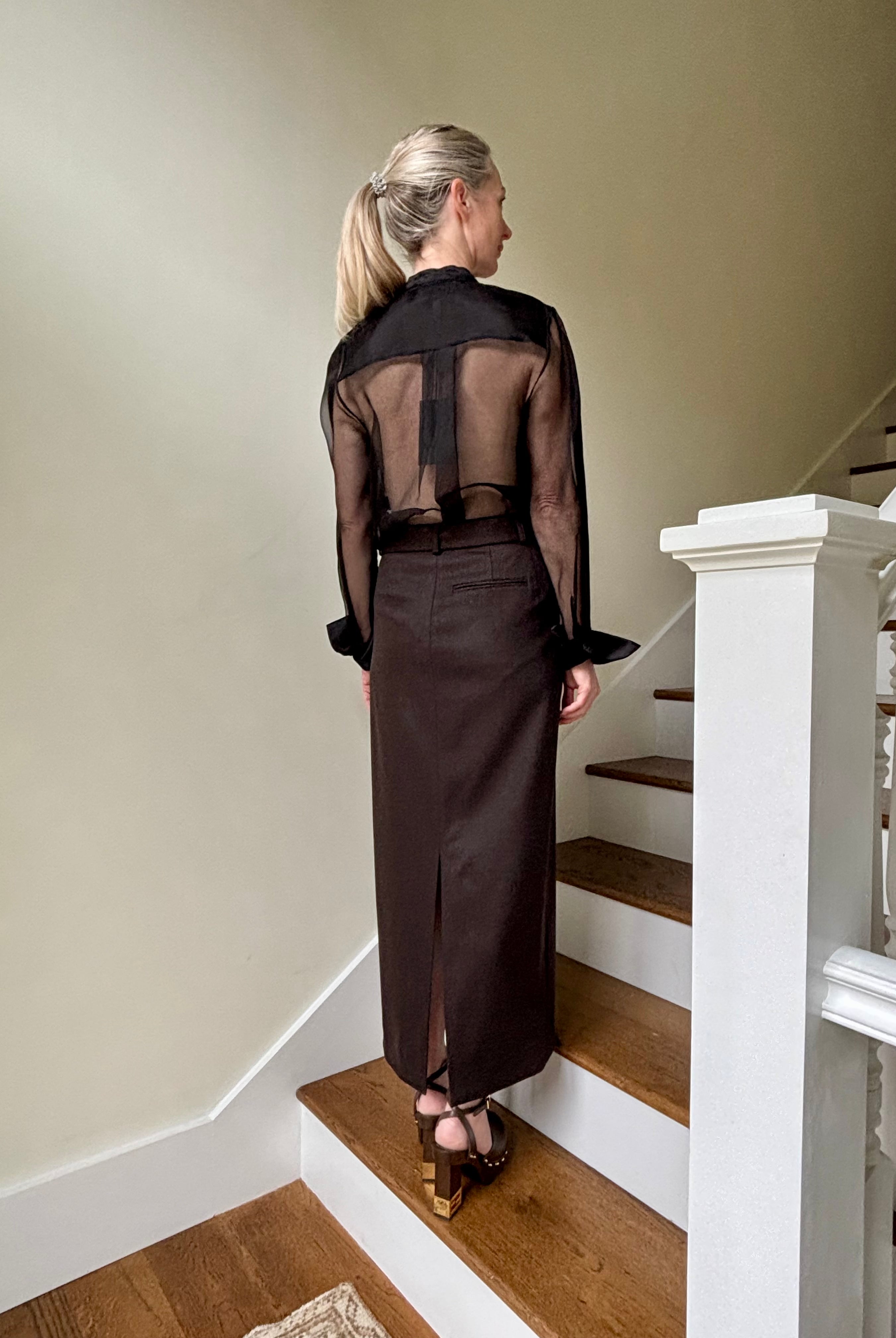 Image of mature woman wearing TWP tailored Slit maxi Skirt in Chocolate brown with back pockets in quality wool cashmere blend fabric