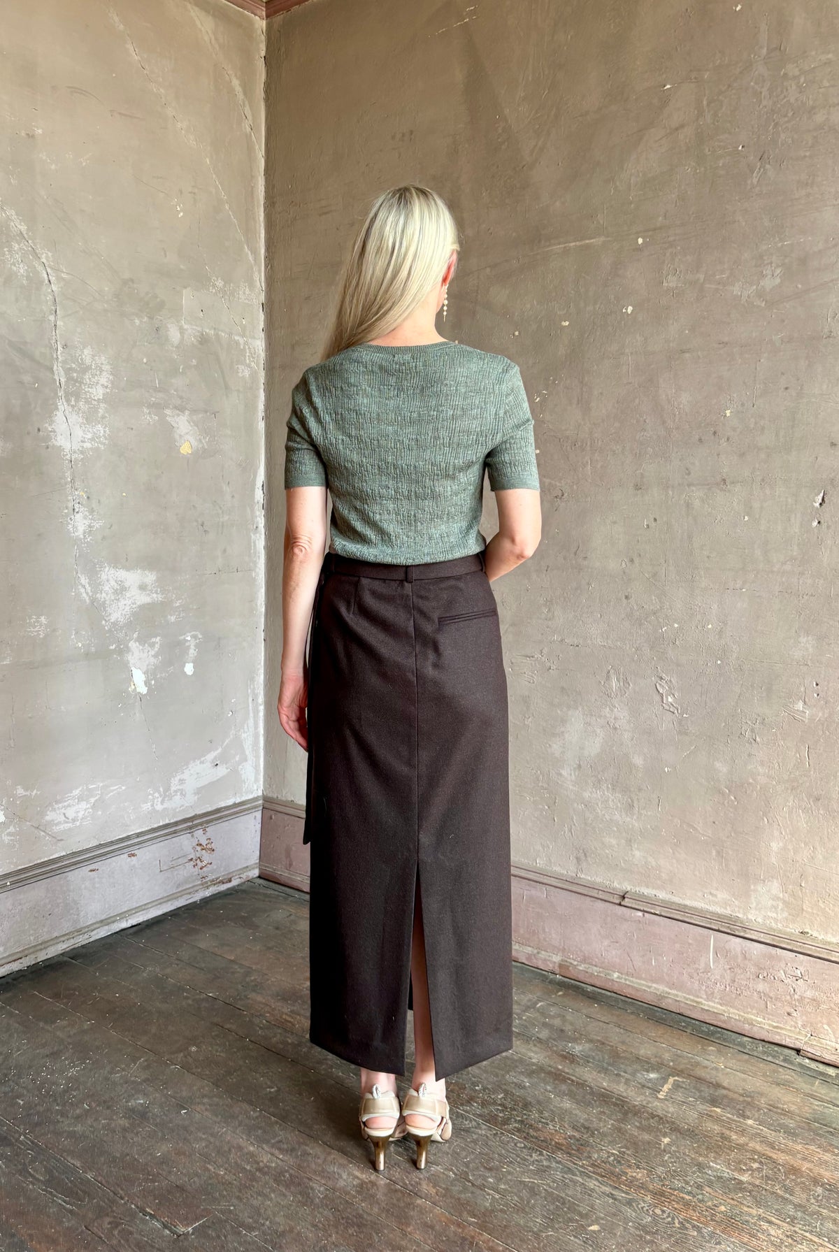 Bacck view of TWP's Slit Pencil Skirt in Chocolate Brown a sophisticated wool-cashmere blend with graceful back vent detail American-made maxi