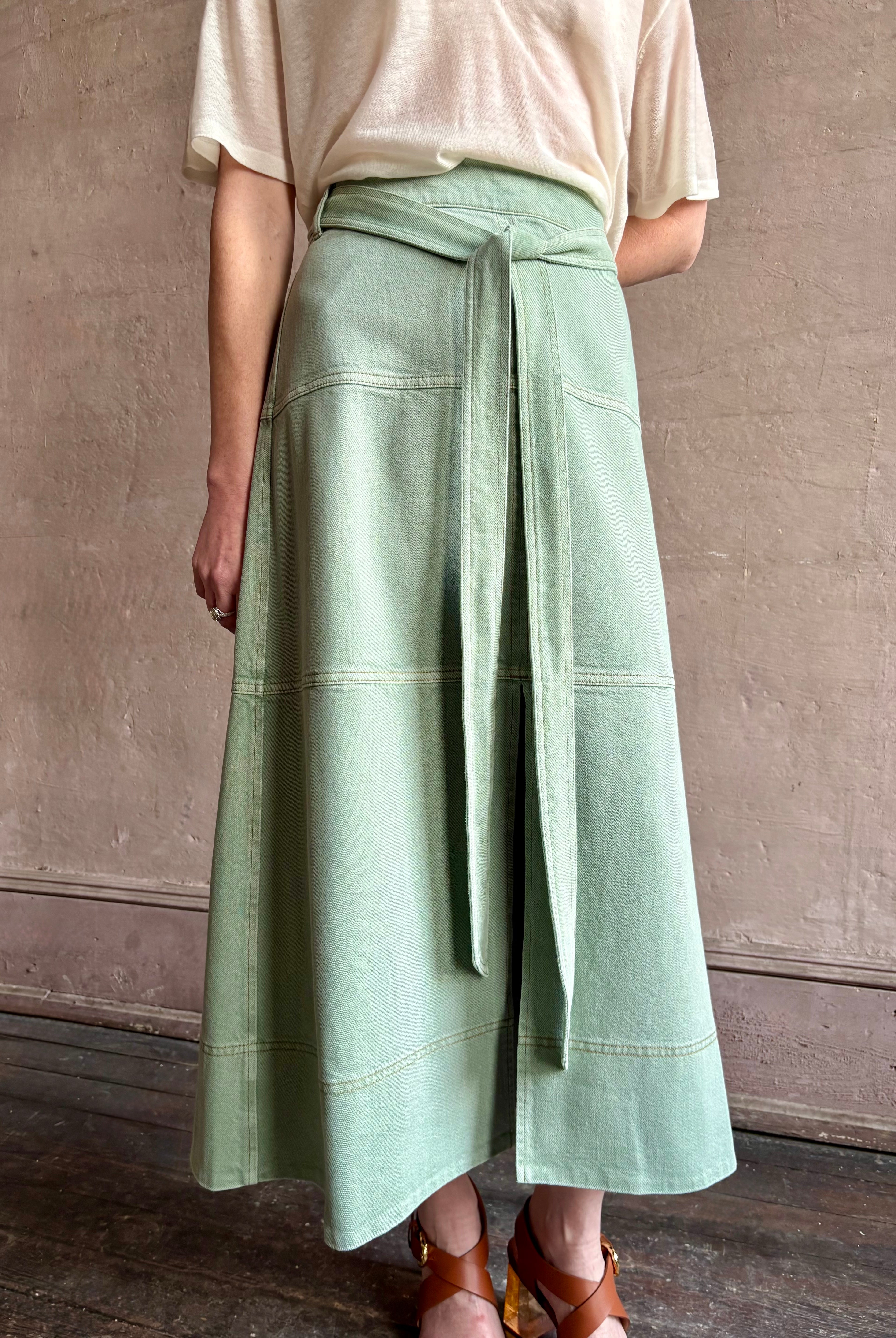 Mature woman wearing premium designer Tanya Taylor Hudley lightweight cotton maxi A-line Skirt in Pistachio green