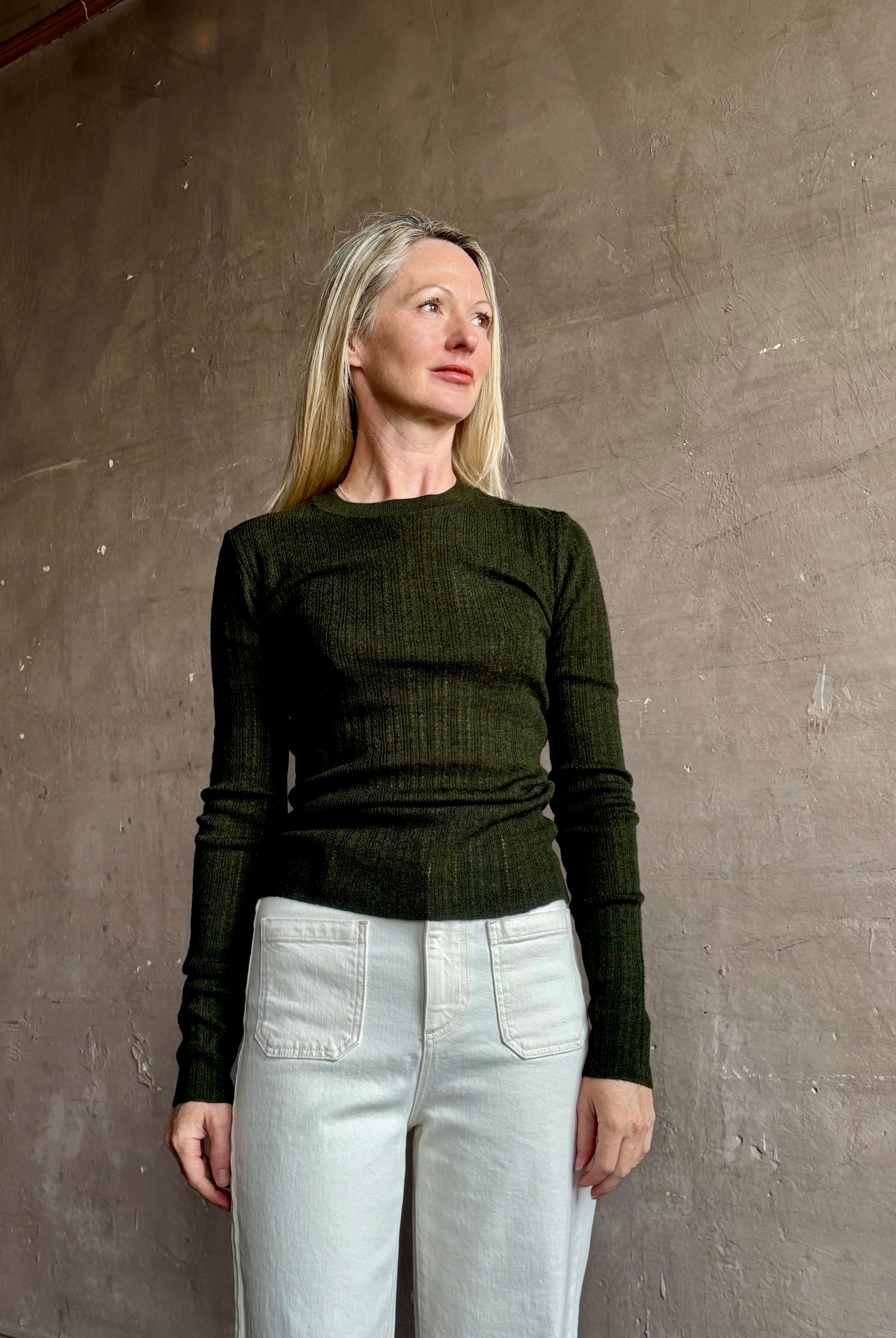 Image of mature woman wearing designer TANYA TAYLOR Crew Neck Kayden merino wool Knit Top in sophisticated heathered Green