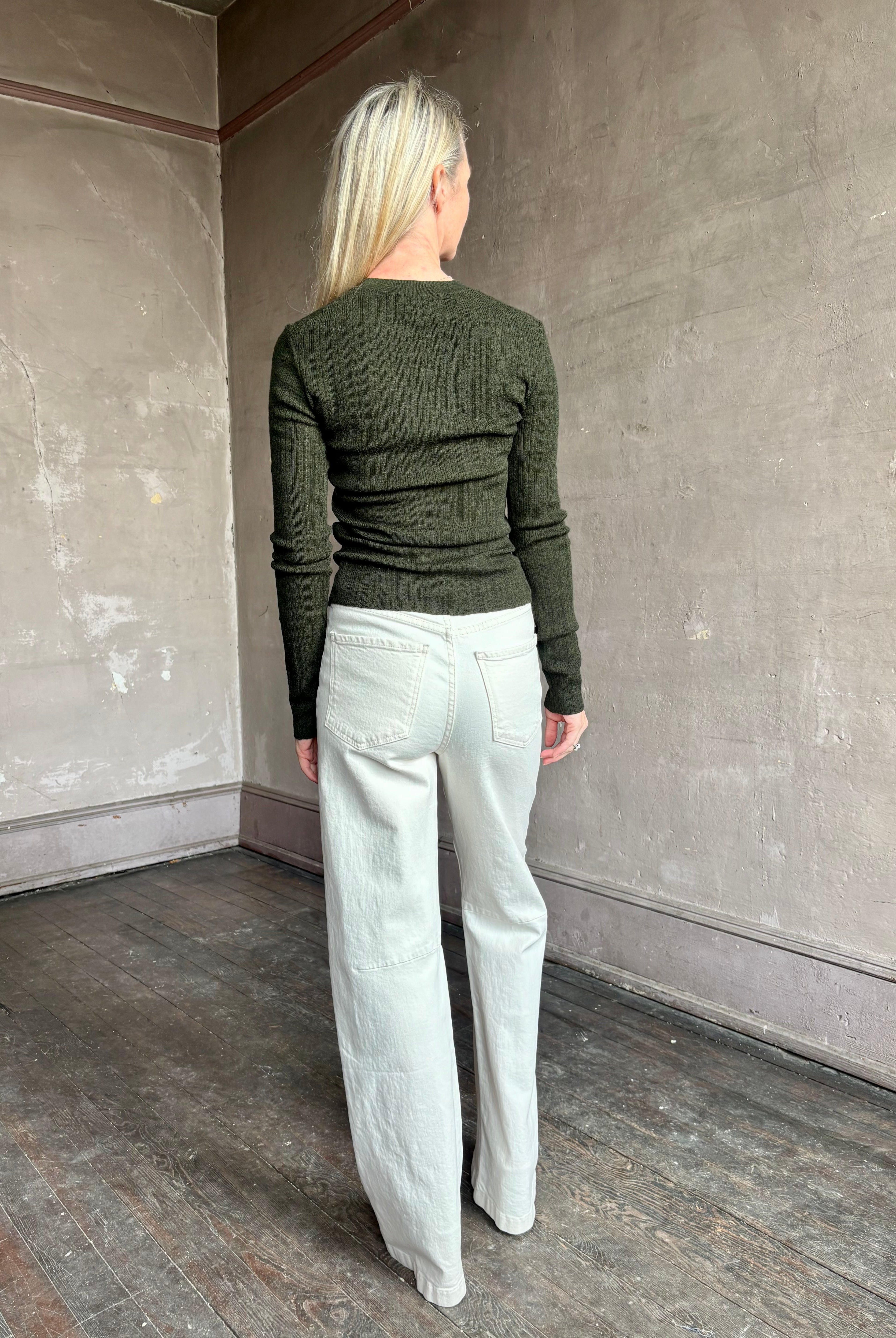 Image of mature woman wearing designer TANYA TAYLOR Crew Neck Kayden merino wool Knit Top in sophisticated heathered Green