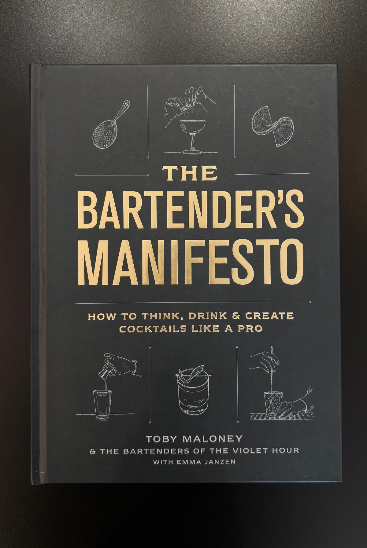 The Bartender's Manifesto book by Toby Maloney hardcover on the principles of balance flavor and technique behind great cocktails