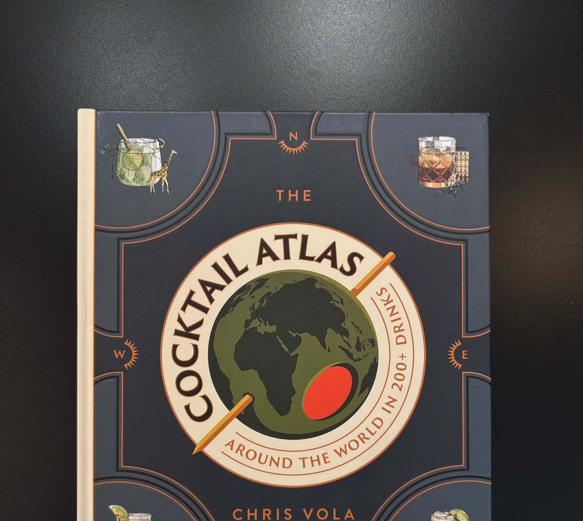 The Cocktail Atlas book by Chris Vola, hardcover book touring the world’s cocktail cultures
