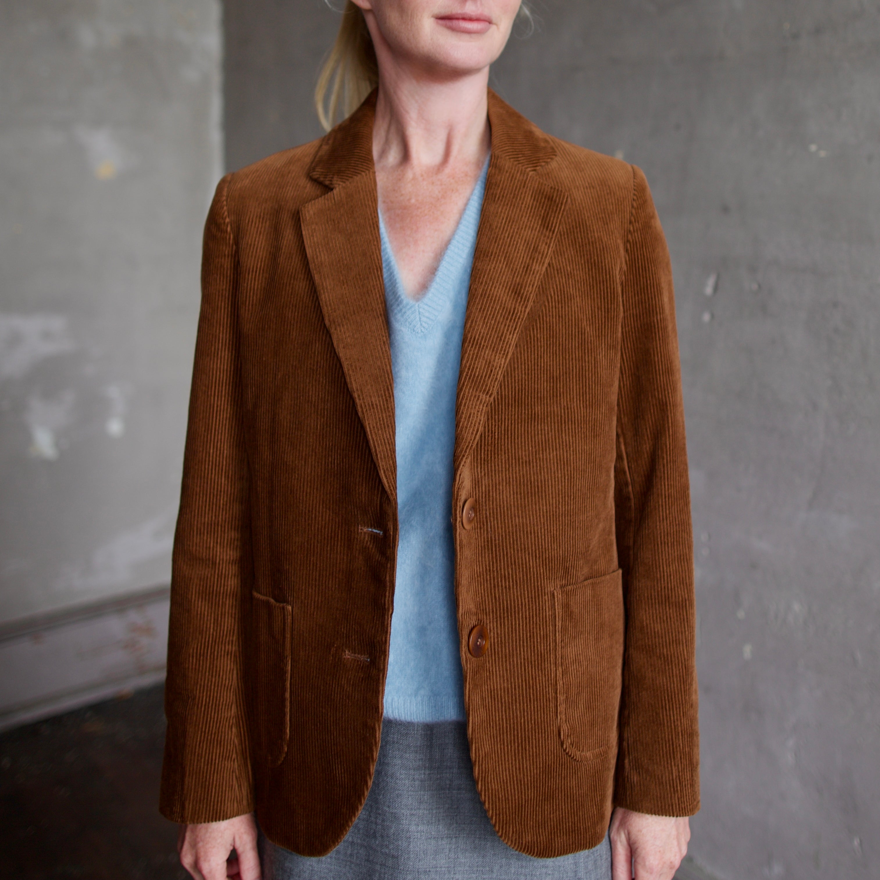 Model wearing the Trovata Skylar brown cotton corduroy blazer over Lisa Yang brushed cashmere sweater