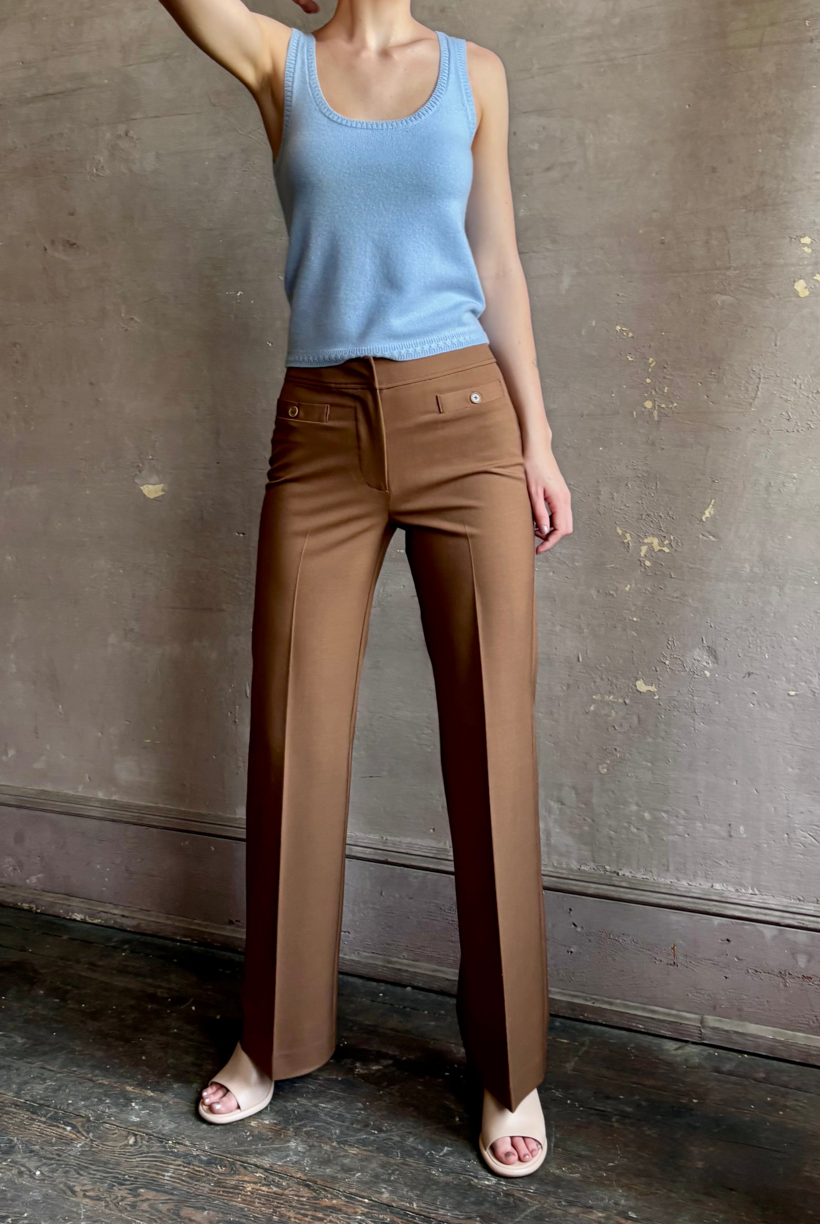 Woman wearing premium wool tailored blanca trousers by luxury designer Ulla Johnson neutral warm brown