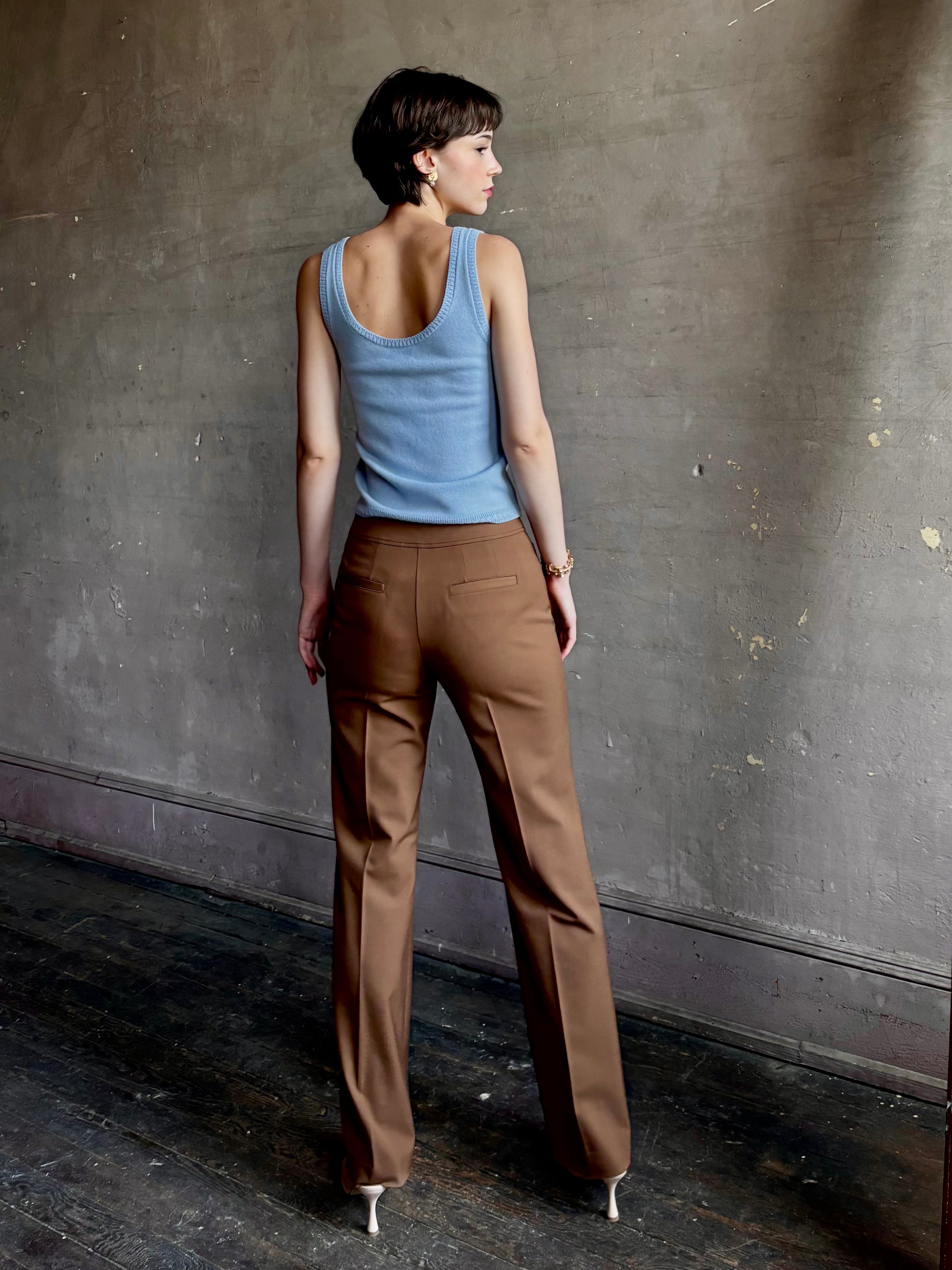 Woman wearing premium wool tailored blanca trousers by luxury designer Ulla Johnson neutral warm brown