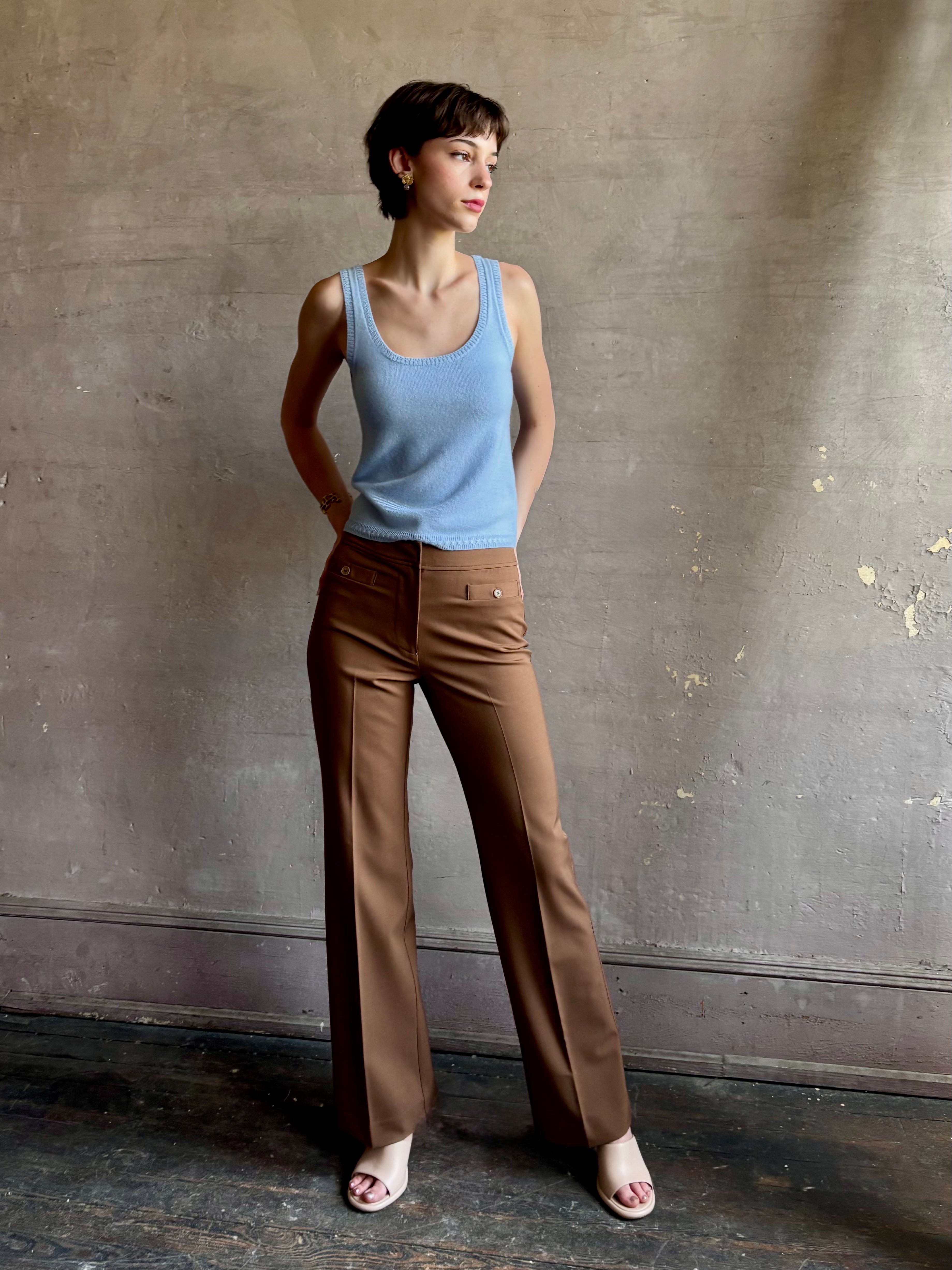 Woman wearing premium wool tailored blanca trousers by luxury designer Ulla Johnson neutral warm brown