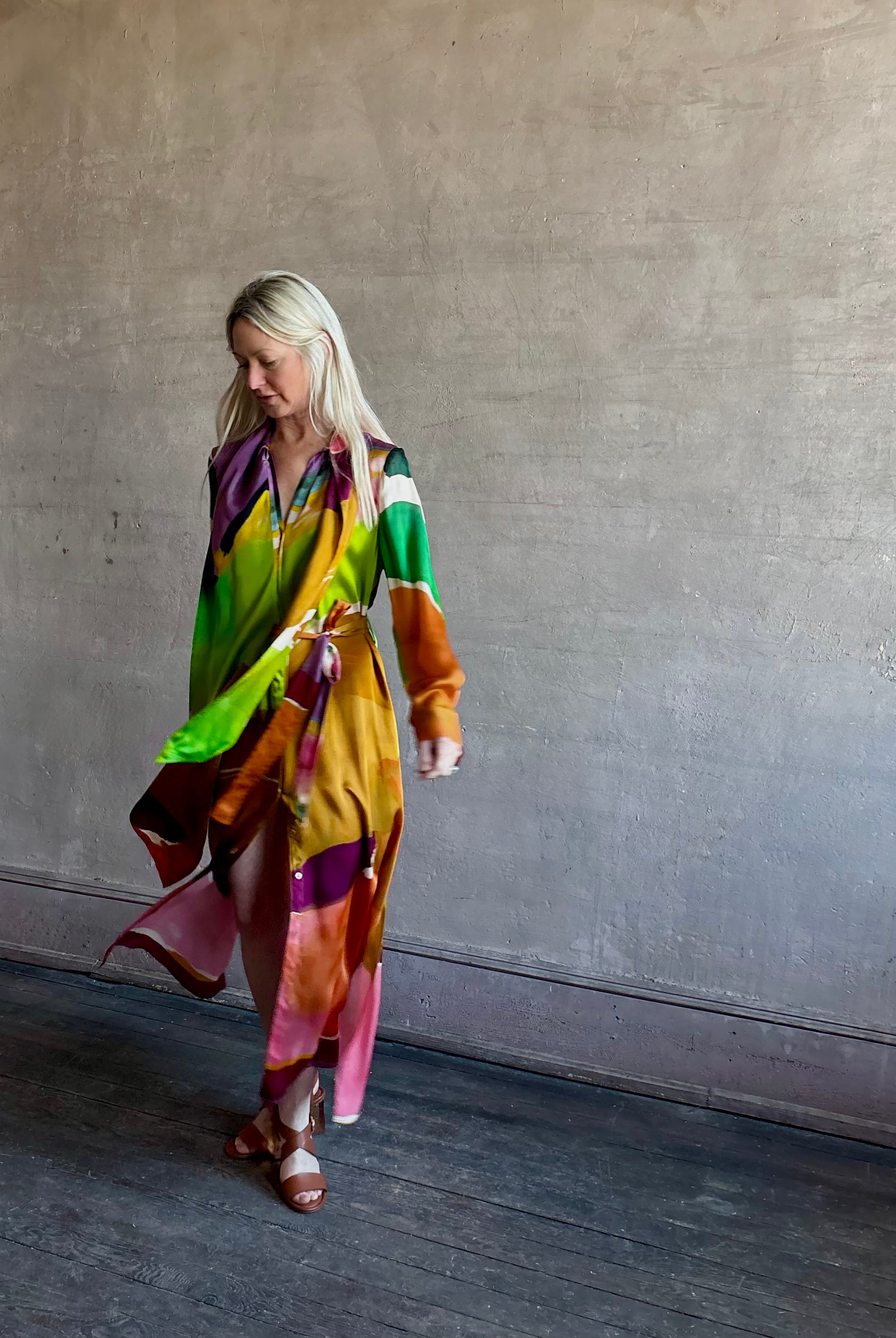 Woman wearing the Critique Long Sleeve fluid Silk maxi Dress from Ulla Johnson in wearable art abstract print via a collaboration with American painter Helen Frankenthaler