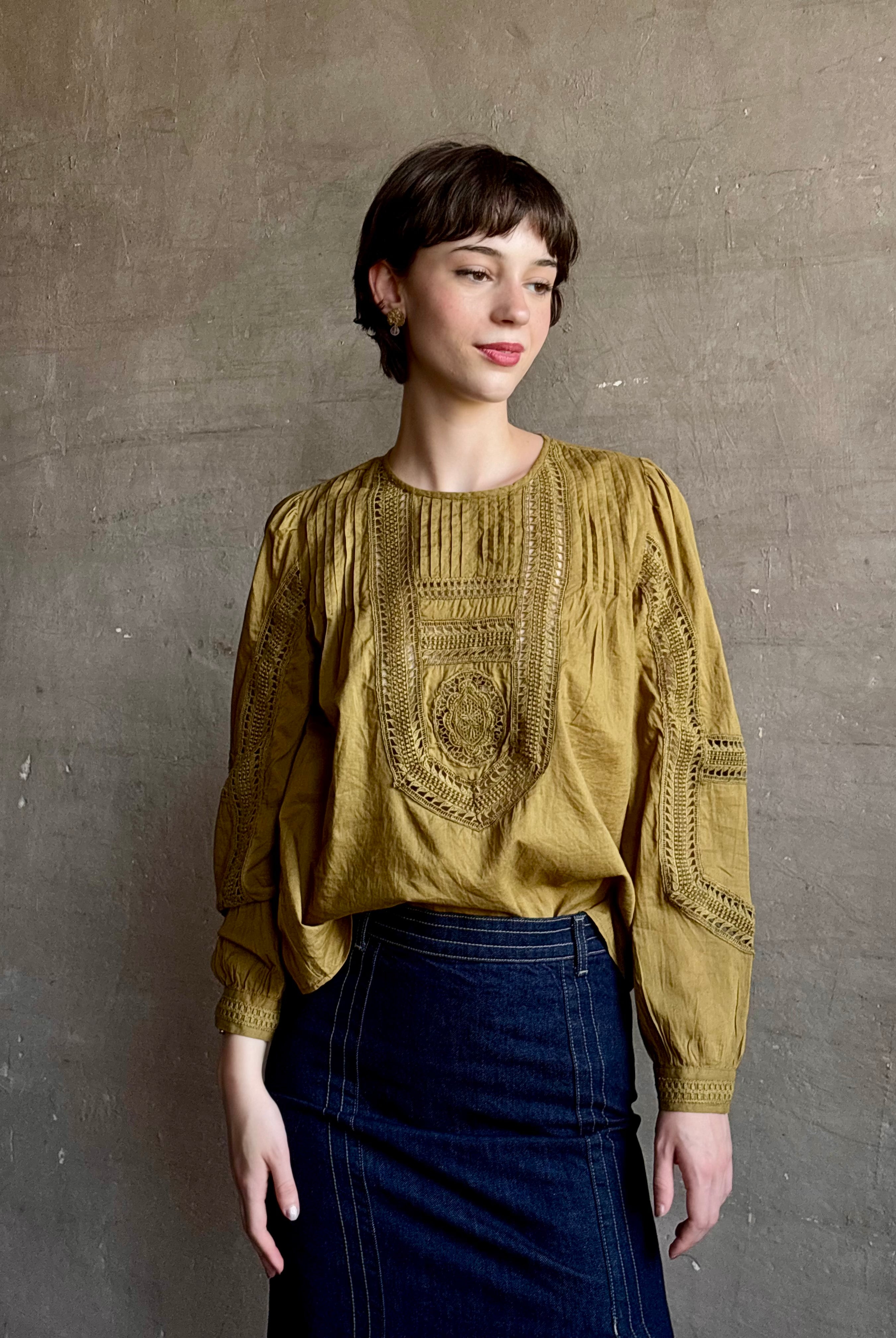 Ulla Johnson Marlowe Long Sleeve Cotton Top in muted green with pintucking and intricate lace crochet