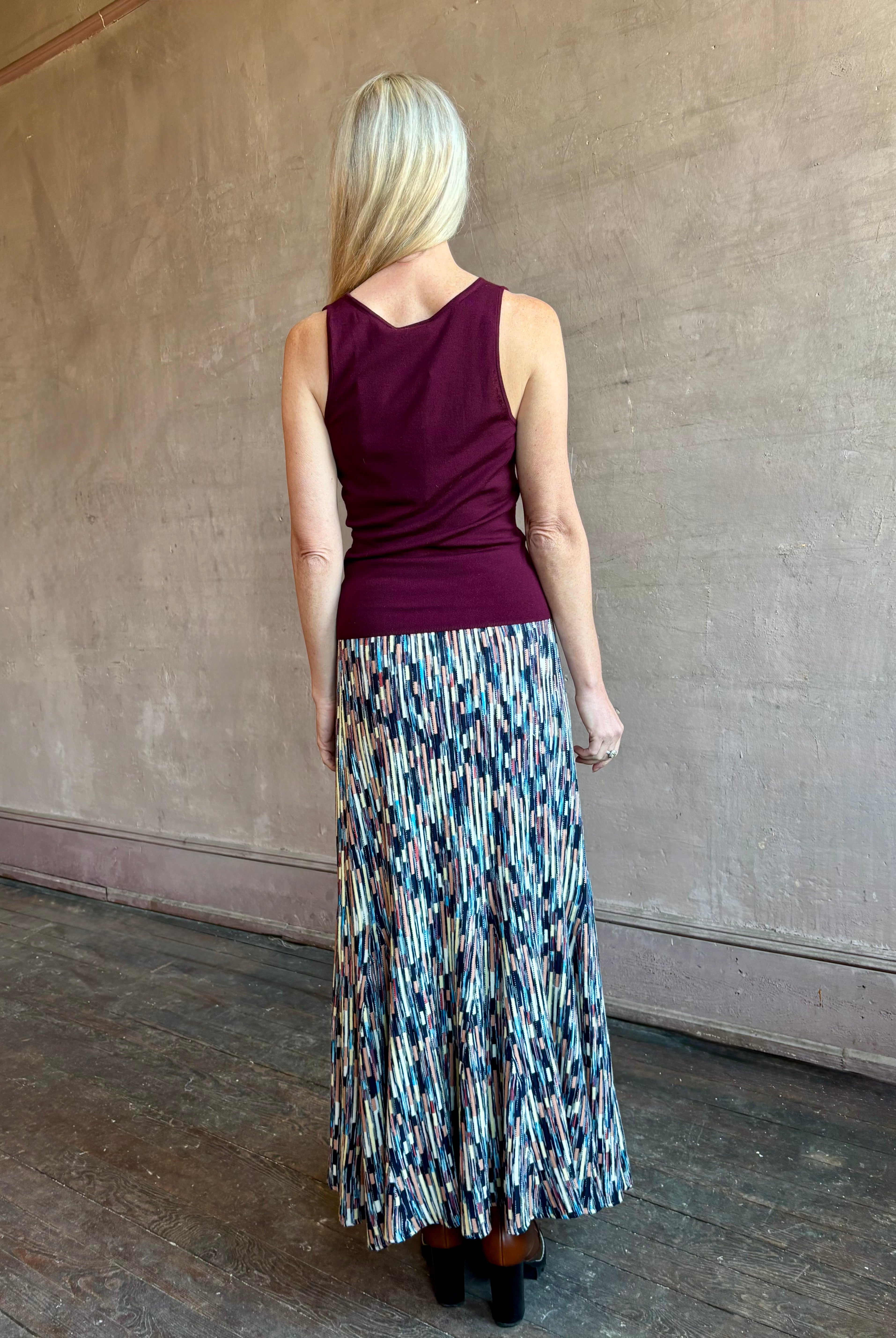 Woman wearing ULLA JOHNSON Marceline cotton knit Skirt with a classic A-line silhouette