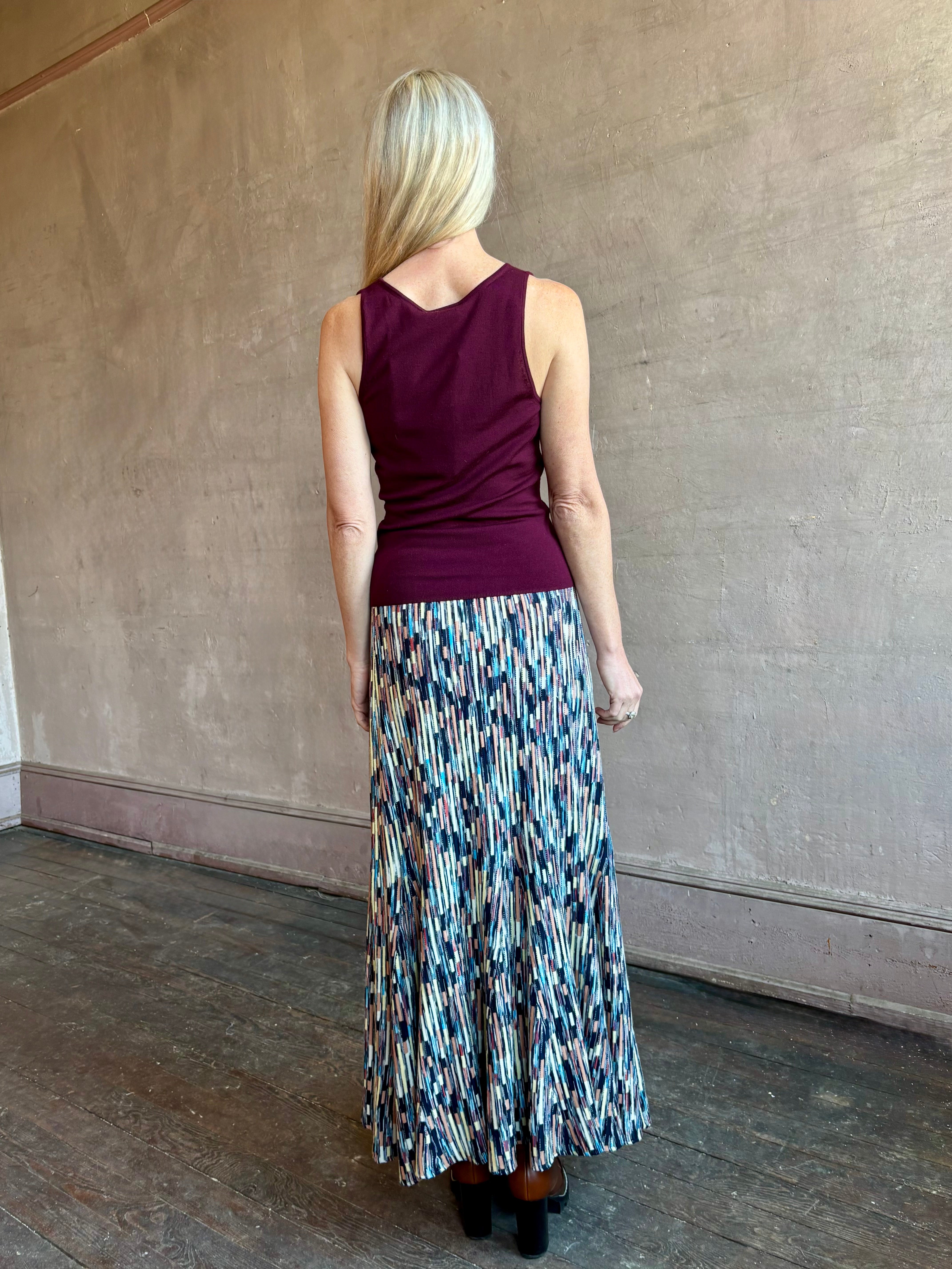 Woman wearing ULLA JOHNSON Marceline cotton knit Skirt with a classic A-line silhouette