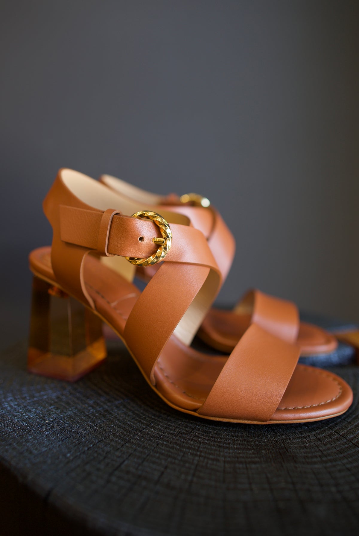 Ulla Johnson Elora Heels in Terra supple leather criss cross straps 3.25" lucite block heel. Sculptural, bohemian-inspired elegance