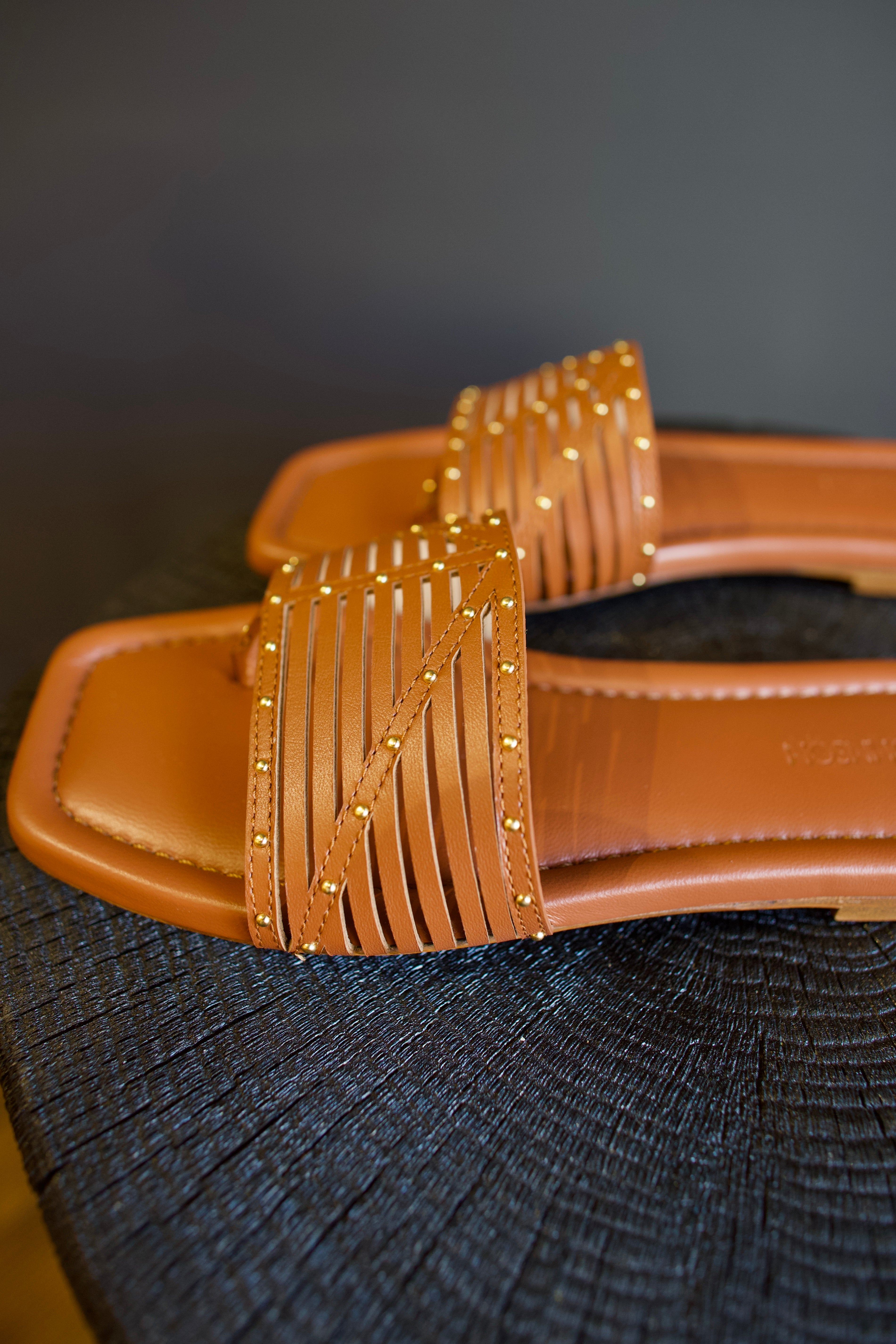 Image of the luxury designer Ulla Johnson Naomi Sandals in brown leather with small elegant gold stud detail