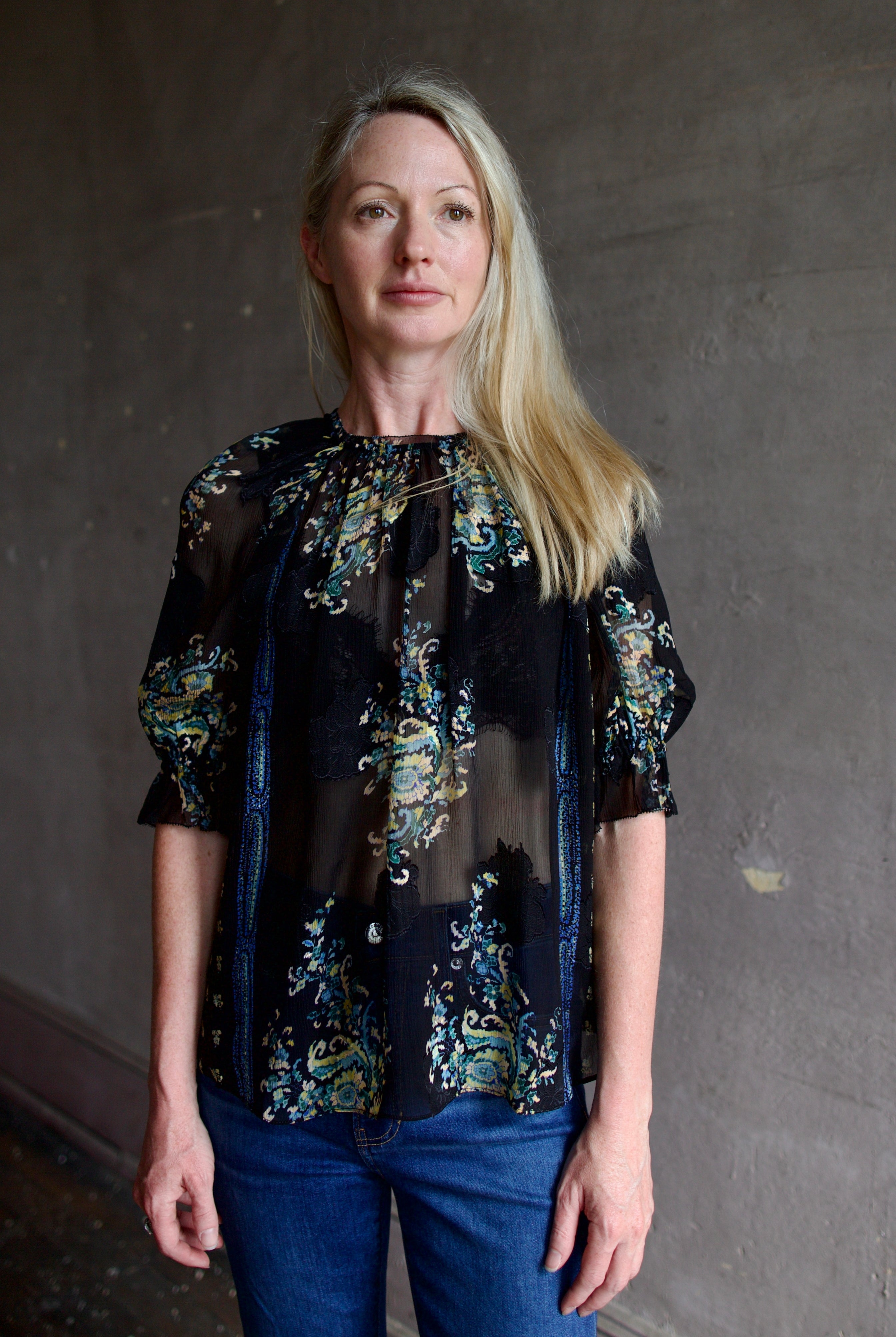 Mature model wearing high-end designer Ulla Johnson Pippa Short Sleeve Blouse in twilight