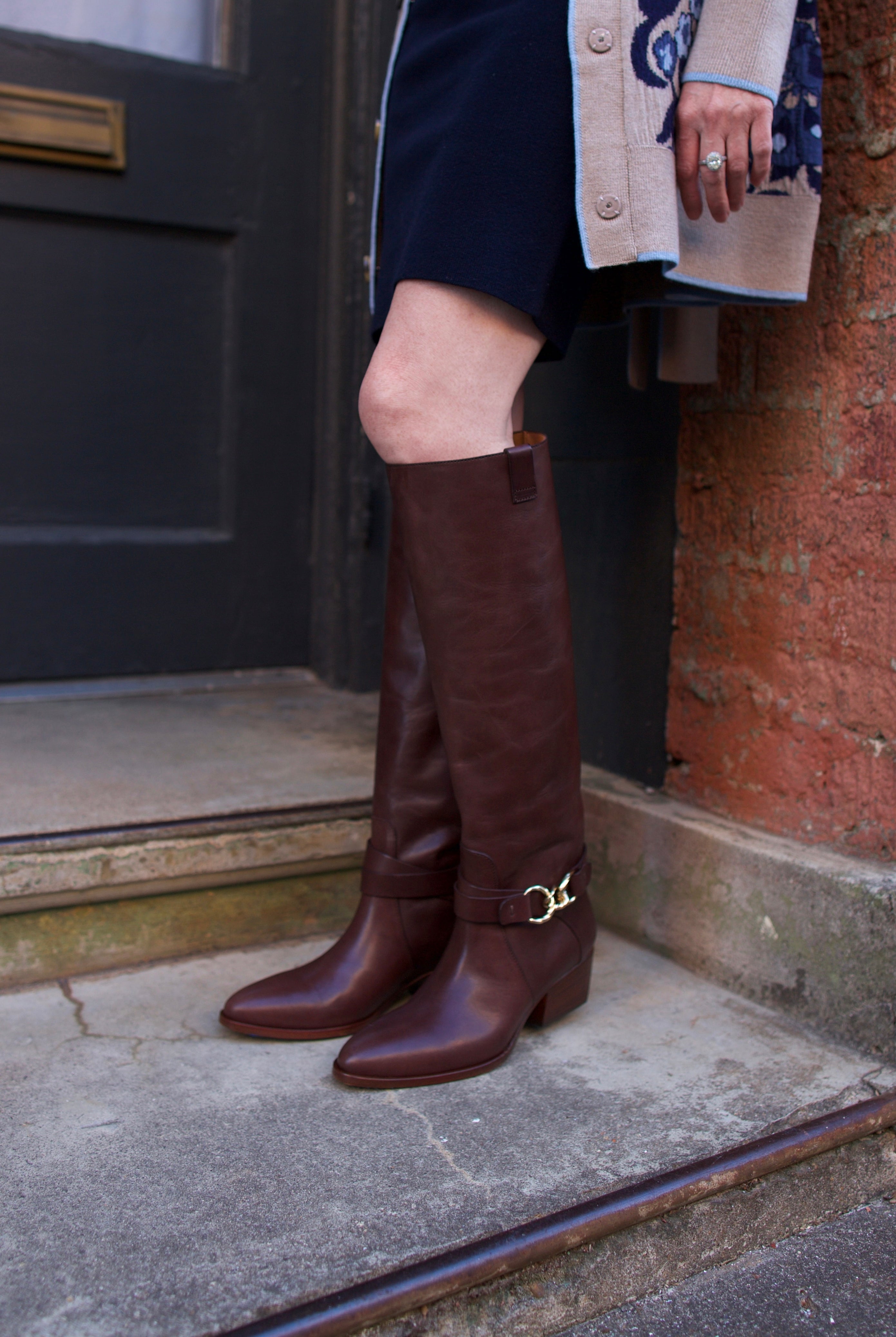 image of woman wearing the Ulla Johnson Willow Cowboy Boots