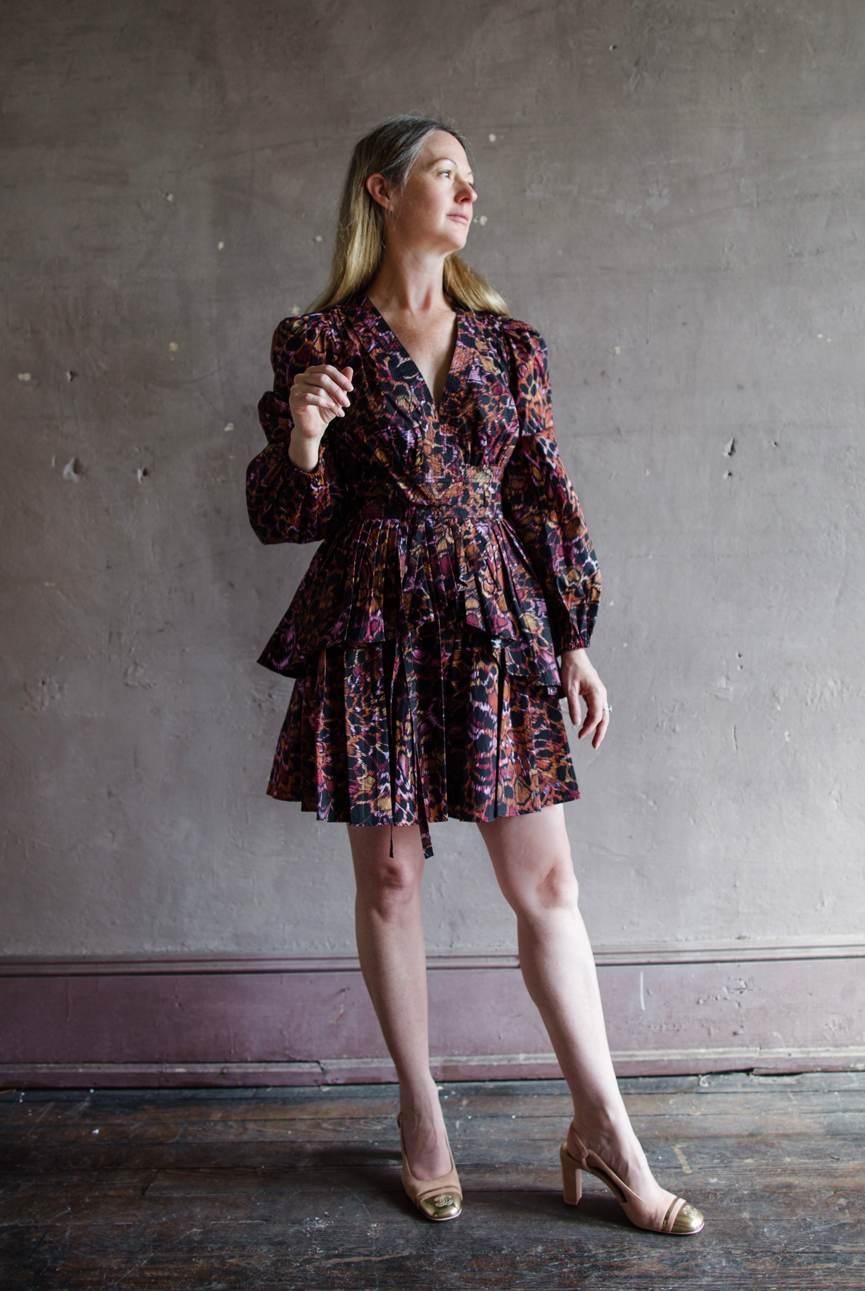 The Lulu cotton mini dress by Ulla Johnson features a v neckline with puff sleeves, tiered skirting and tailored bodice.