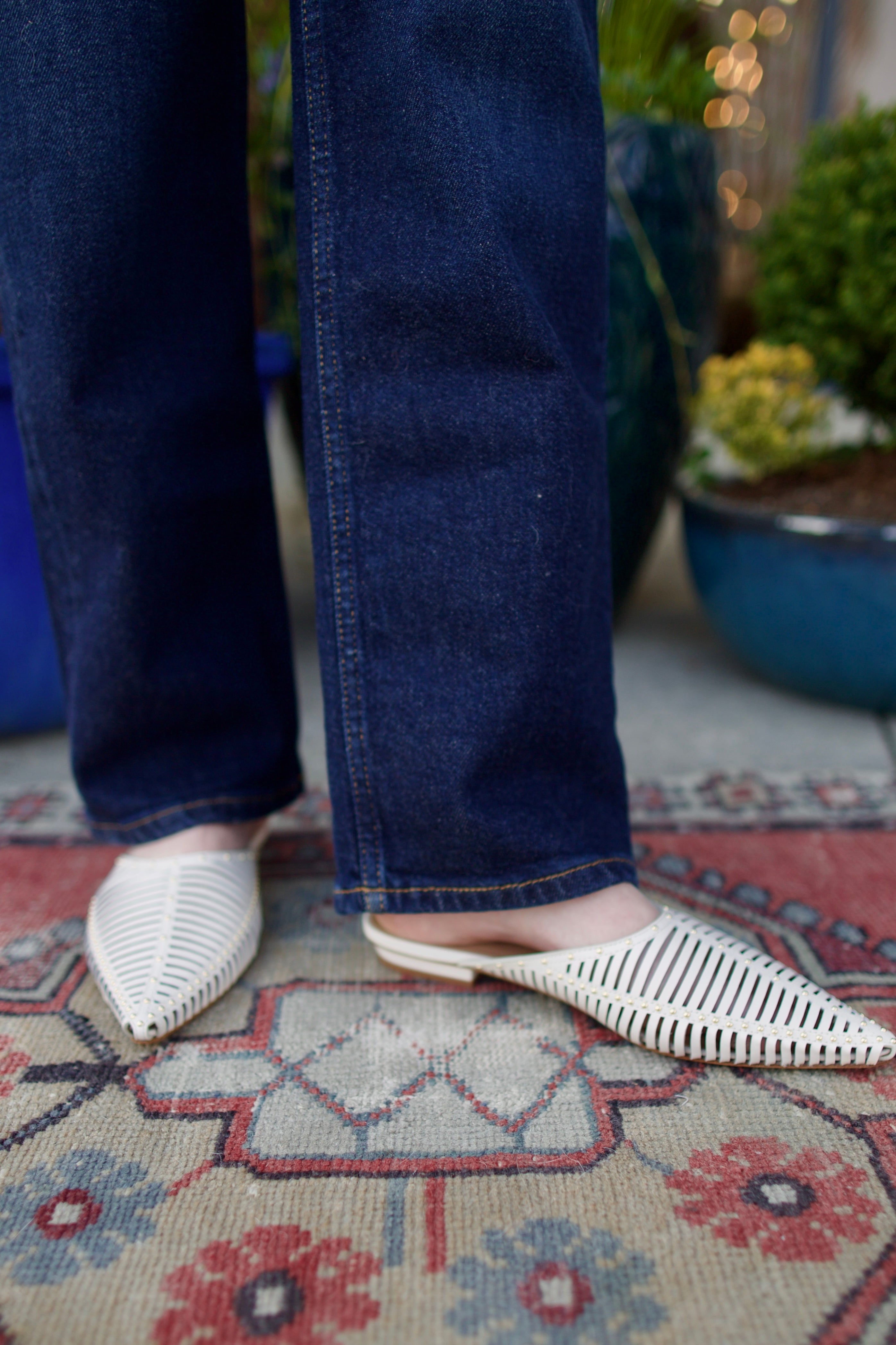 Image of white Ulla Johnson Octavia Mule shoe with gold studs slip on premium leather shoe with pointed toe