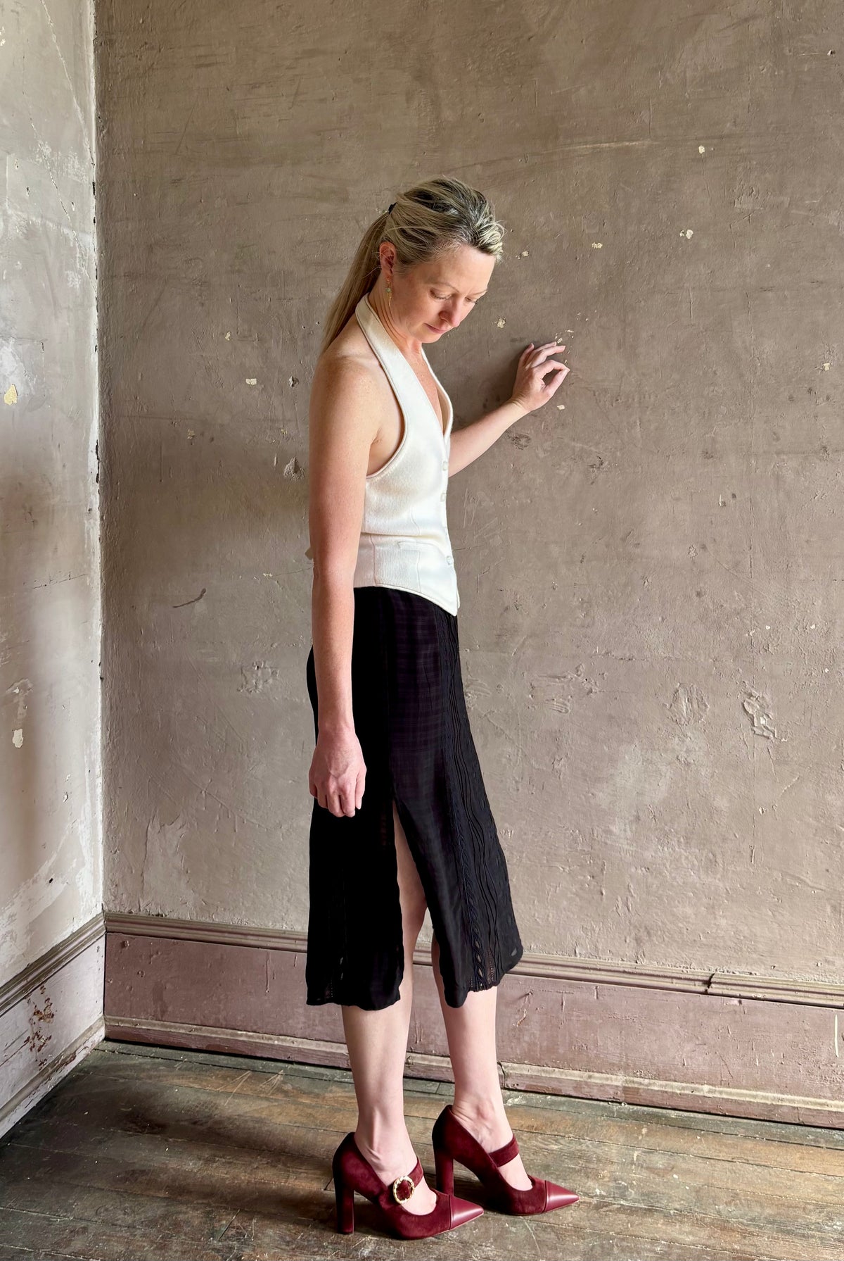 woman wearing Vanessa Bruno midi skirt semi-sheer jacquard black-on-black plaid delicate eyelet and pintucking