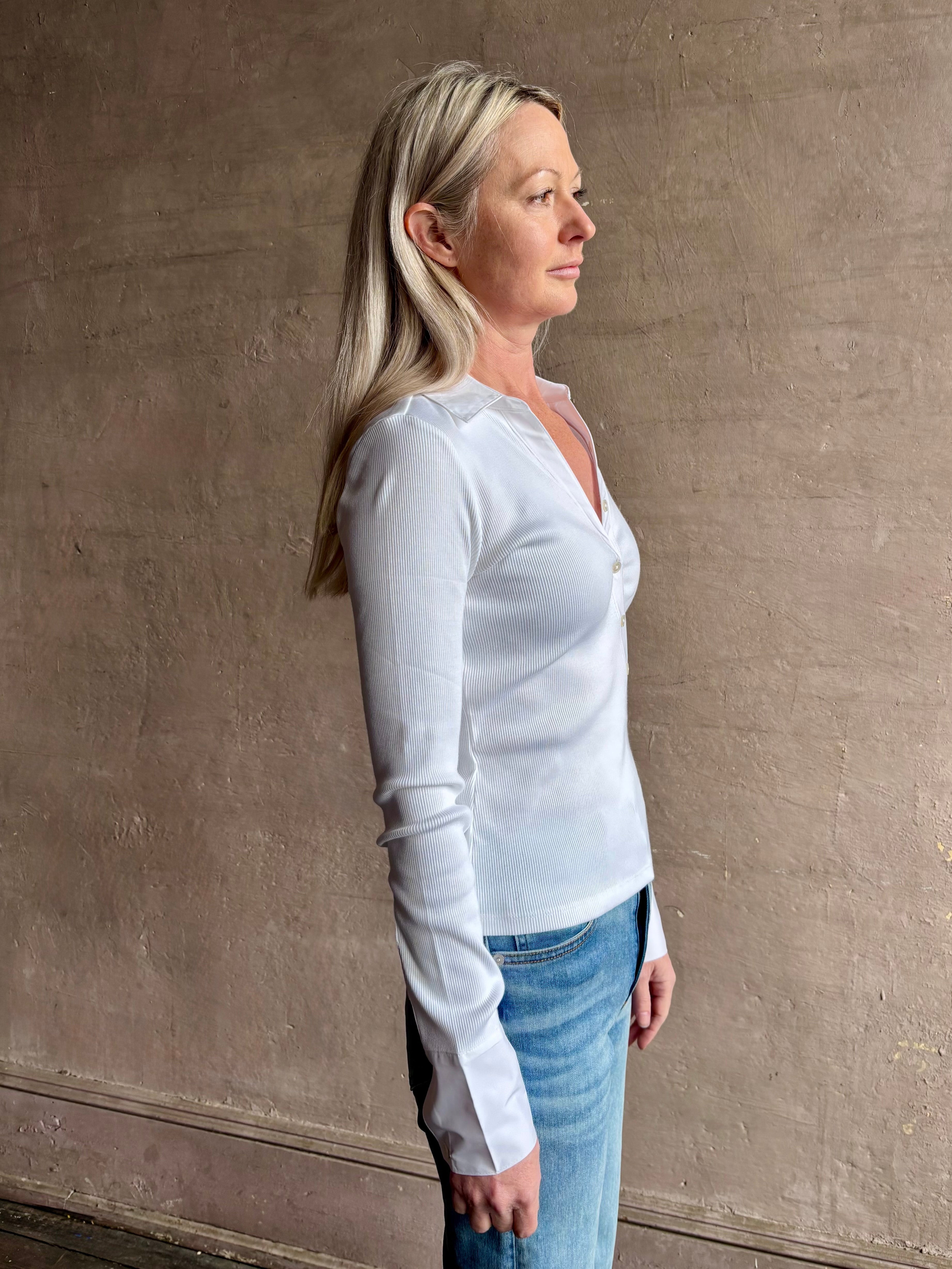 Image of mature woman wearing a VERONICA BEARD white Brenner Top in Premium Pima Cotton