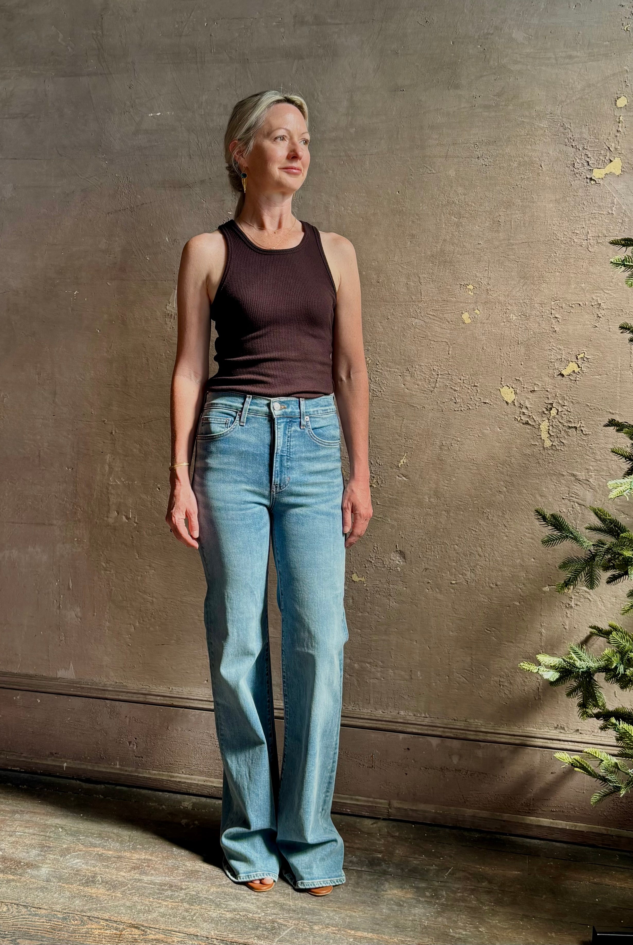 Mature woman wearing American-Made Veronica Beard Crosby Denim High Rise Straight Leg Jean Stretch Medium Wash